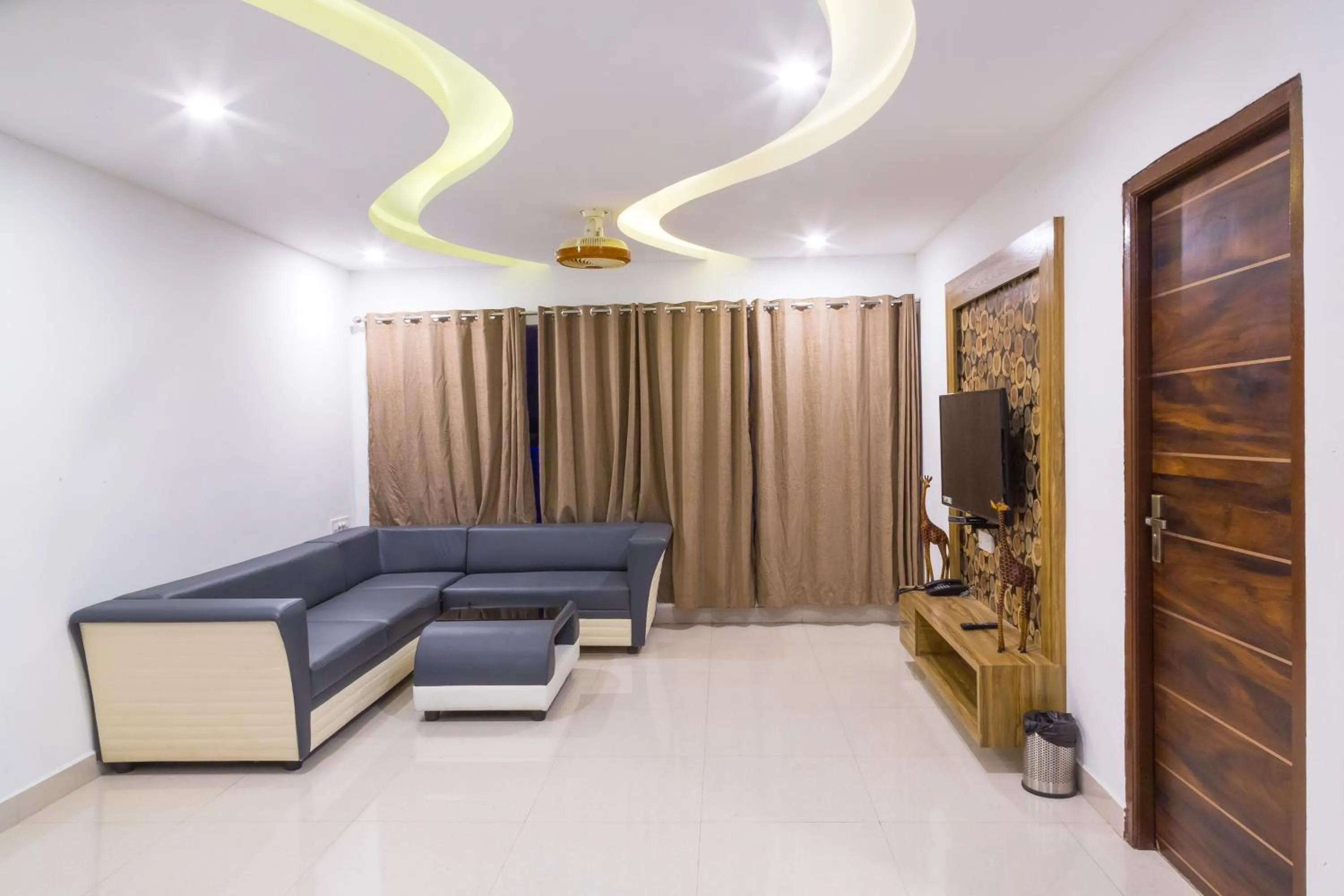 TV and multimedia in The Porch Inn Hotel & Service Apartments Near Nimhans Hospital