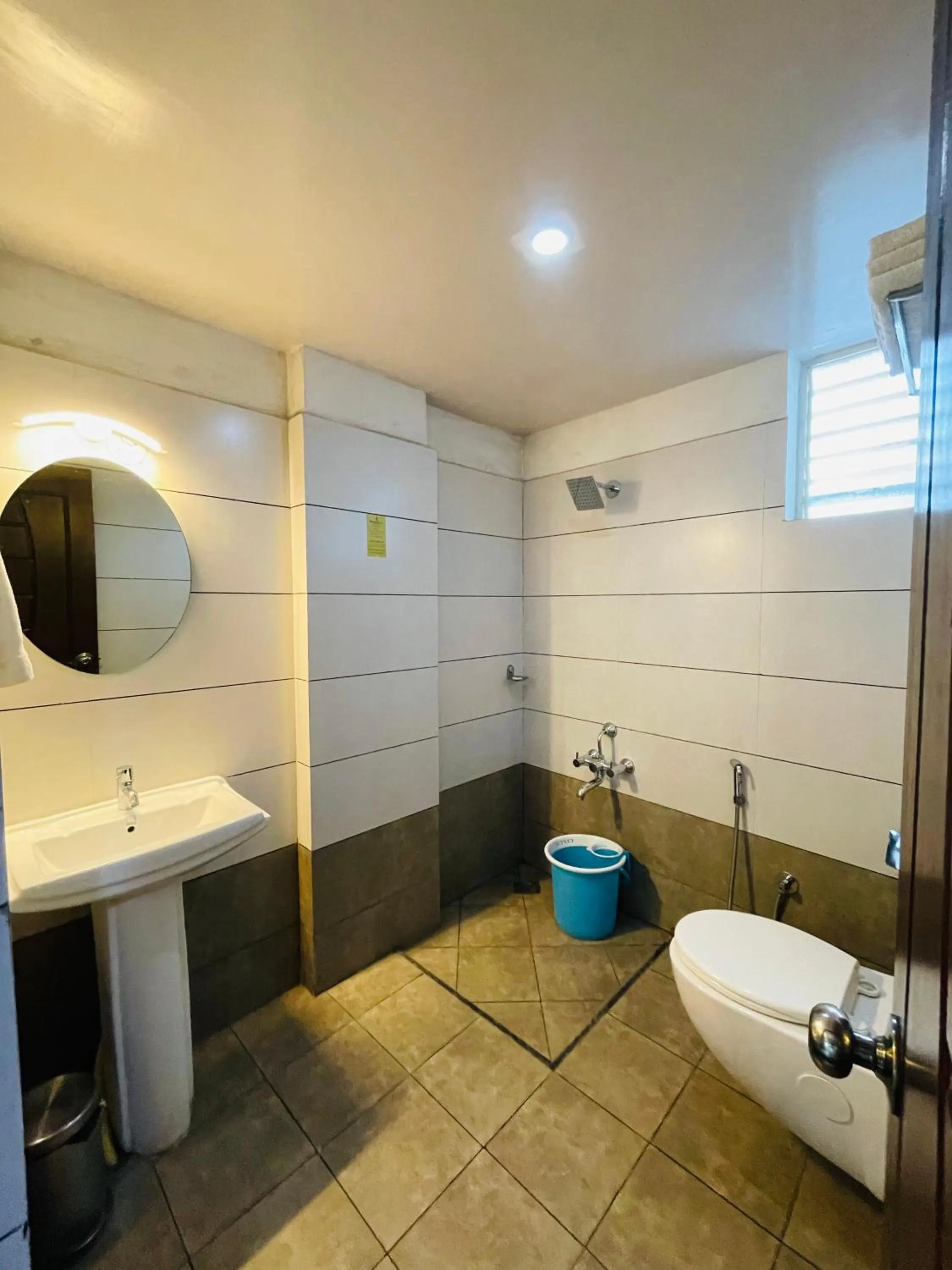 Bathroom in The Porch Inn Hotel & Service Apartments Near Nimhans Hospital