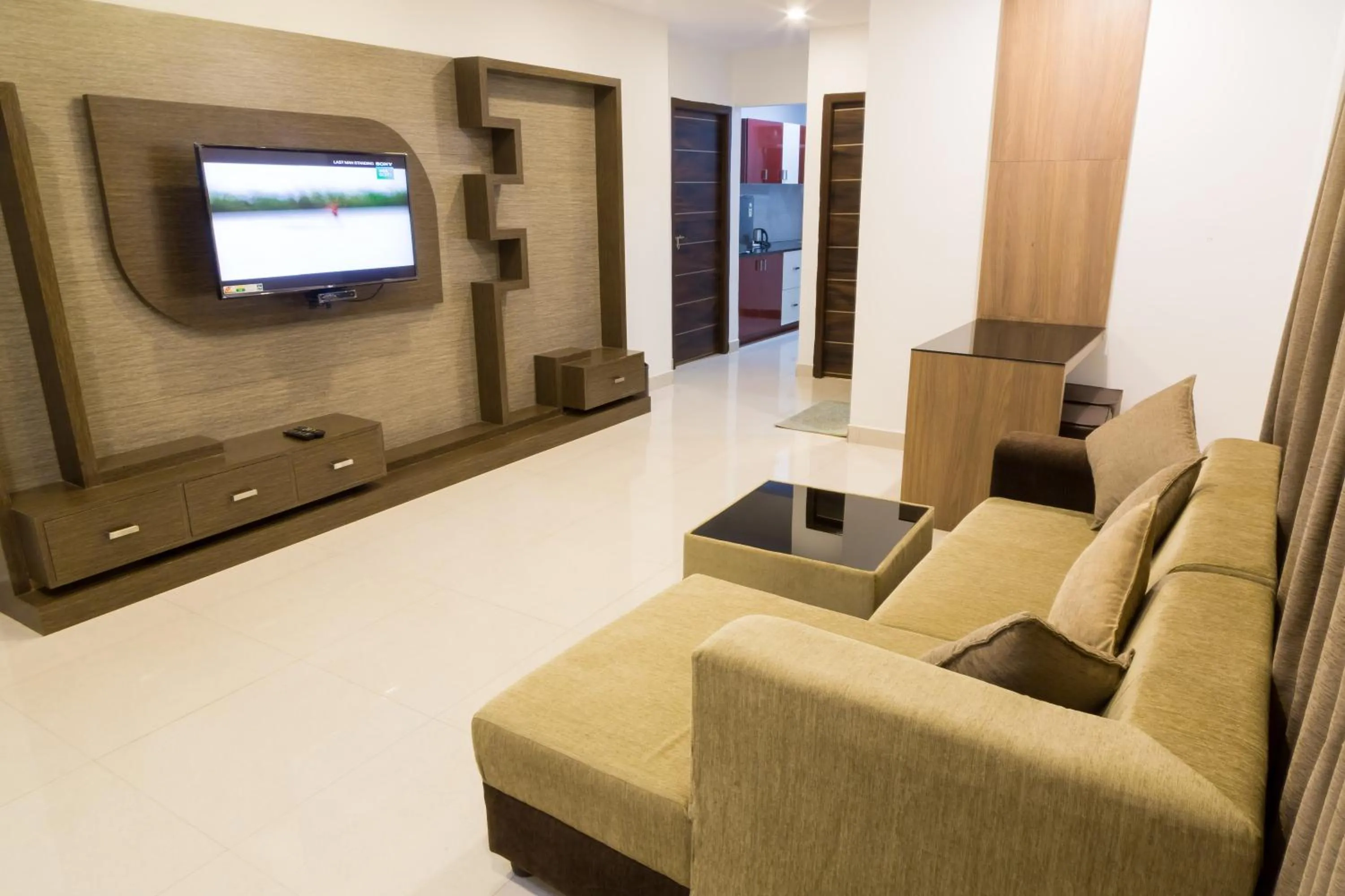TV and multimedia in The Porch Inn Hotel & Service Apartments Near Nimhans Hospital