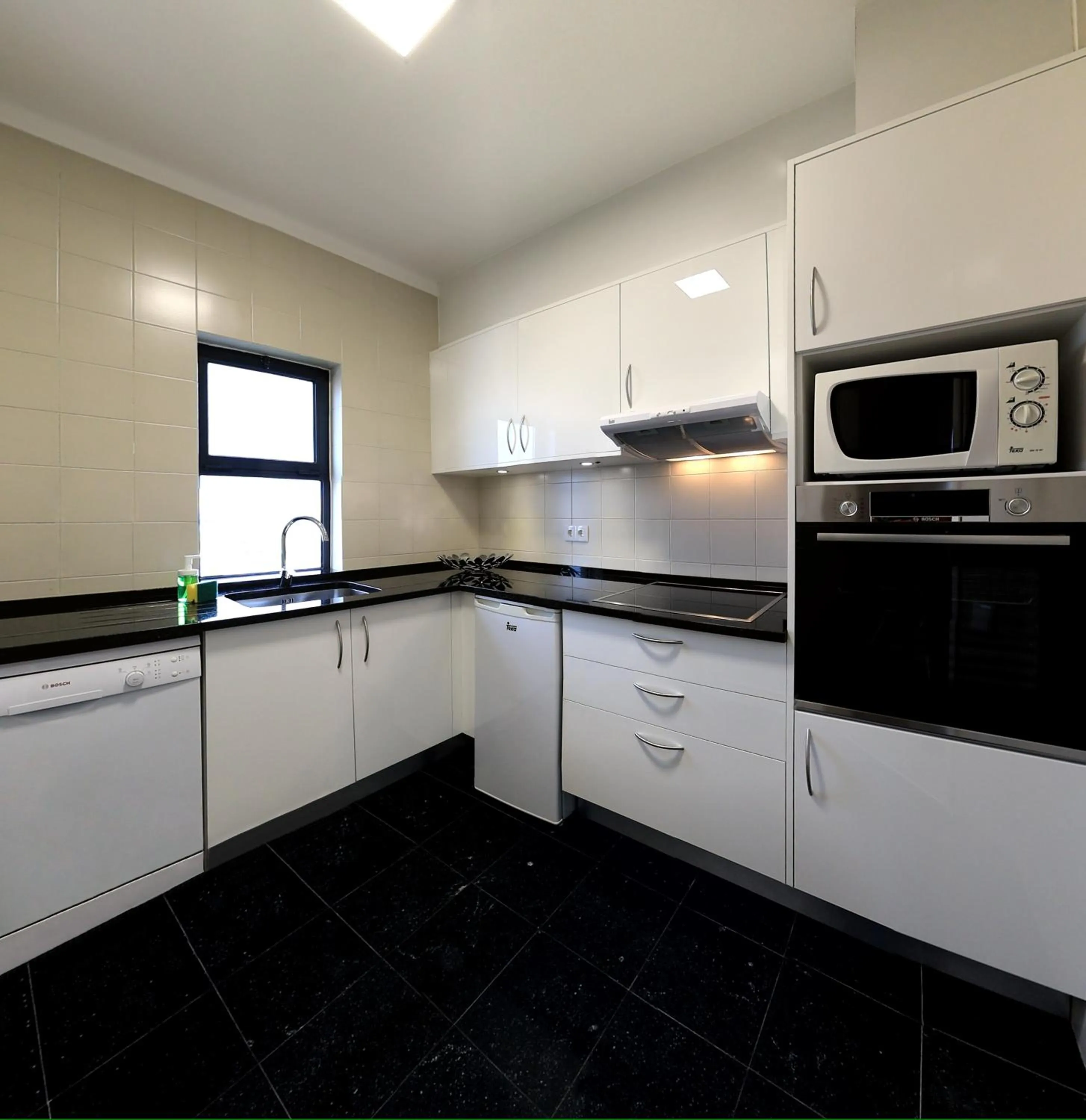 Kitchen or kitchenette in Vila Petra