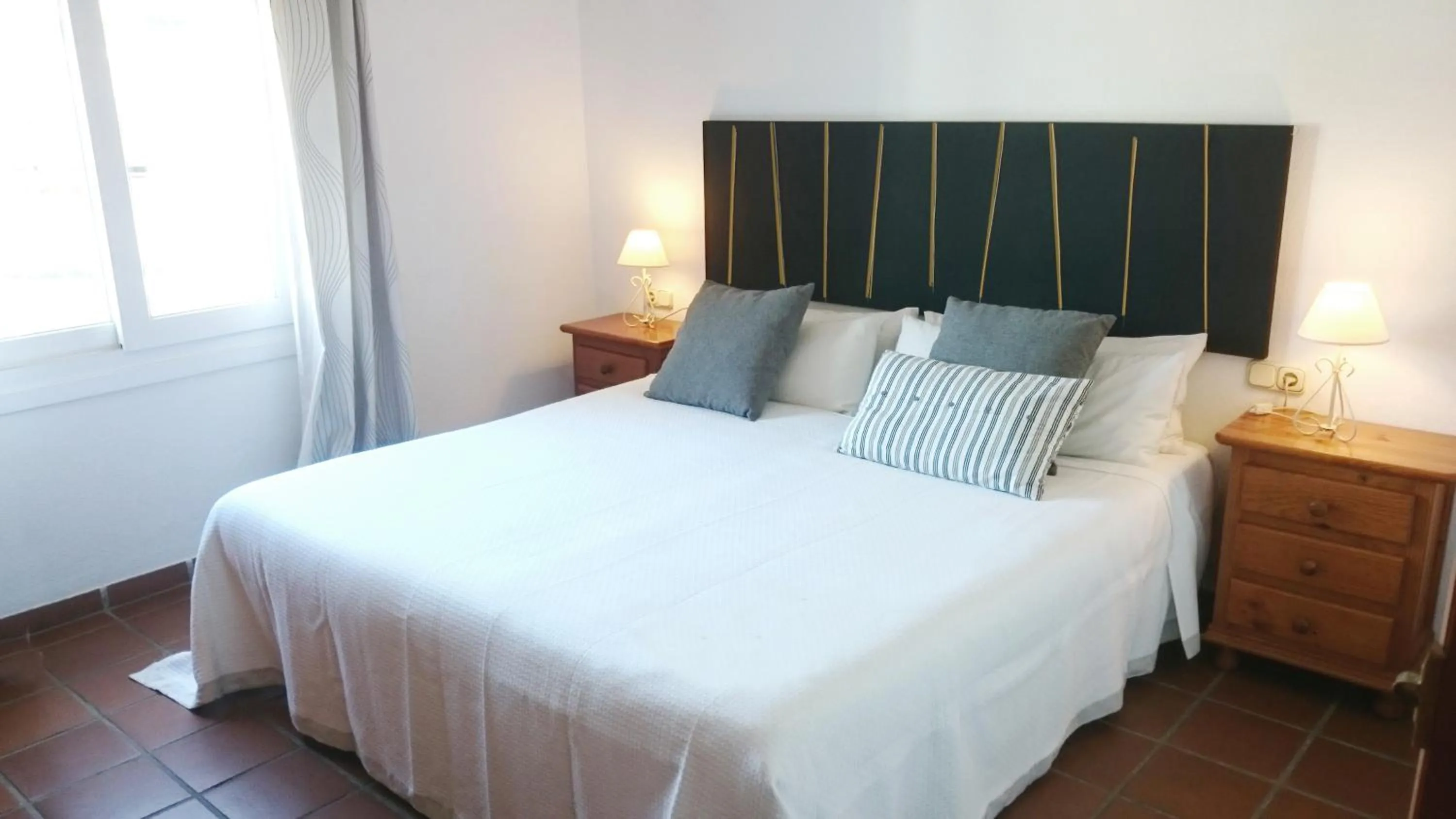 Bed in Apartamentos Turísticos La Mundial