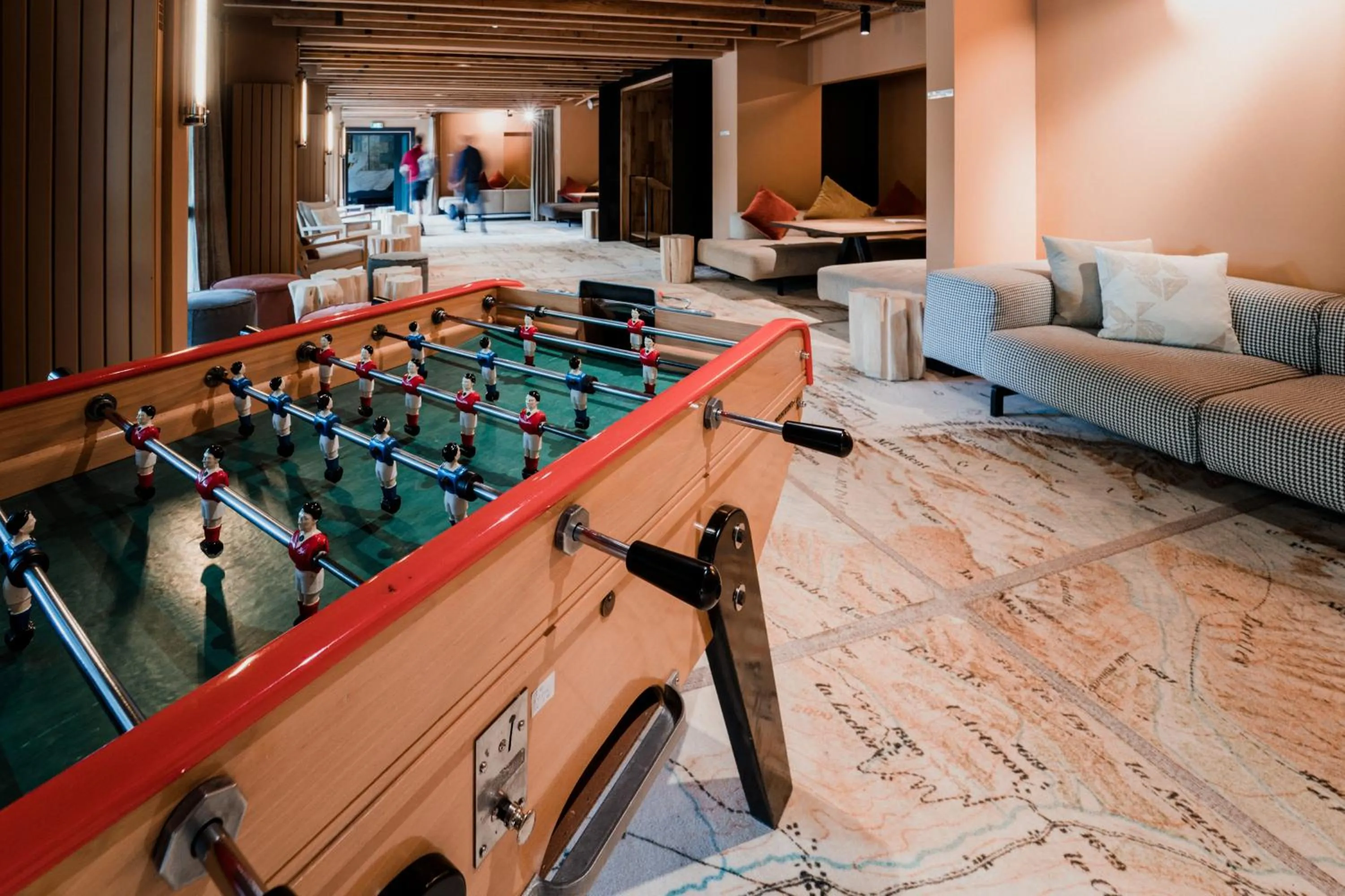 Communal lounge/ TV room in La Folie Douce Hotels Chamonix