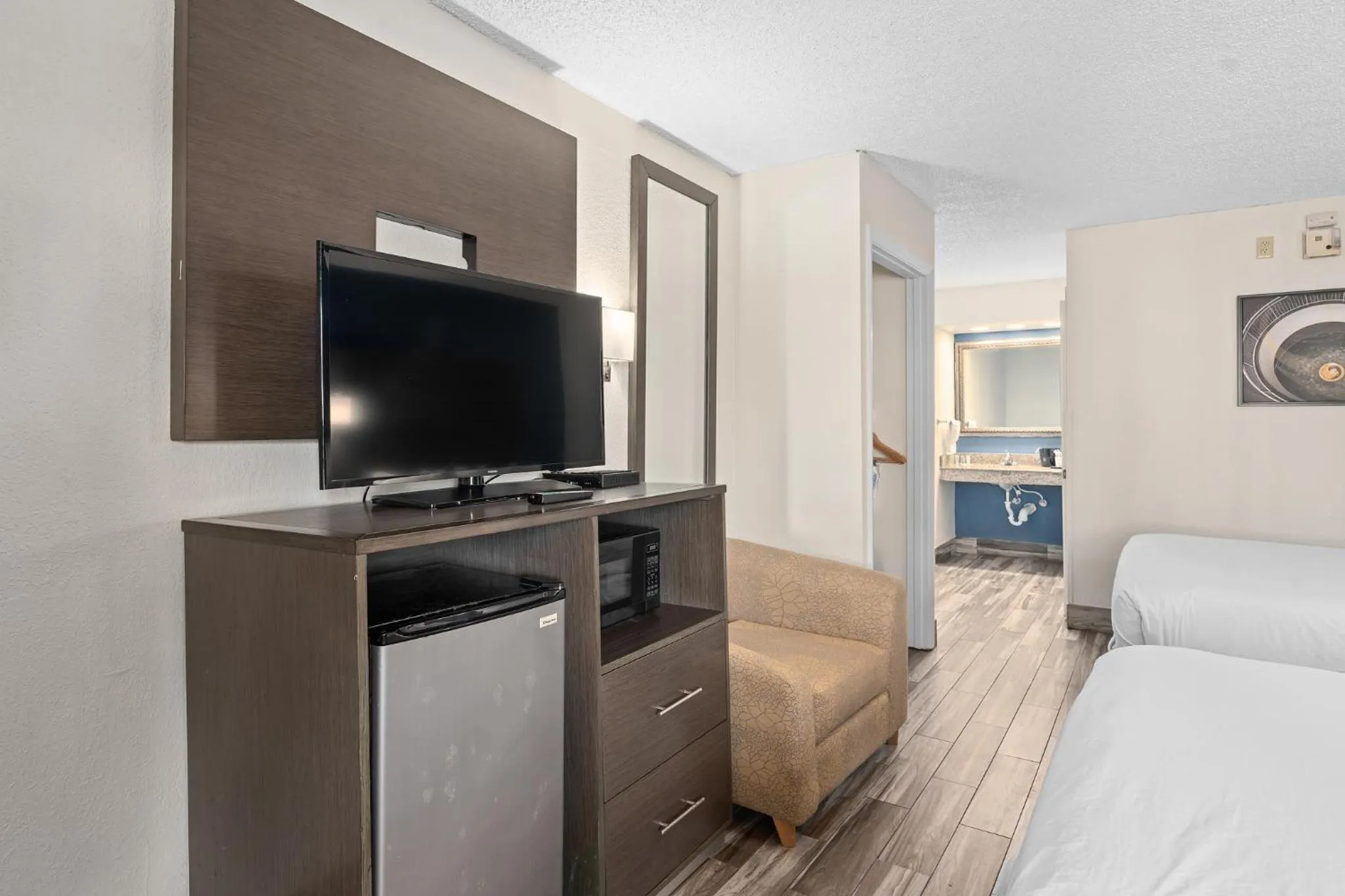 Bed in Baymont by Wyndham Orlando East