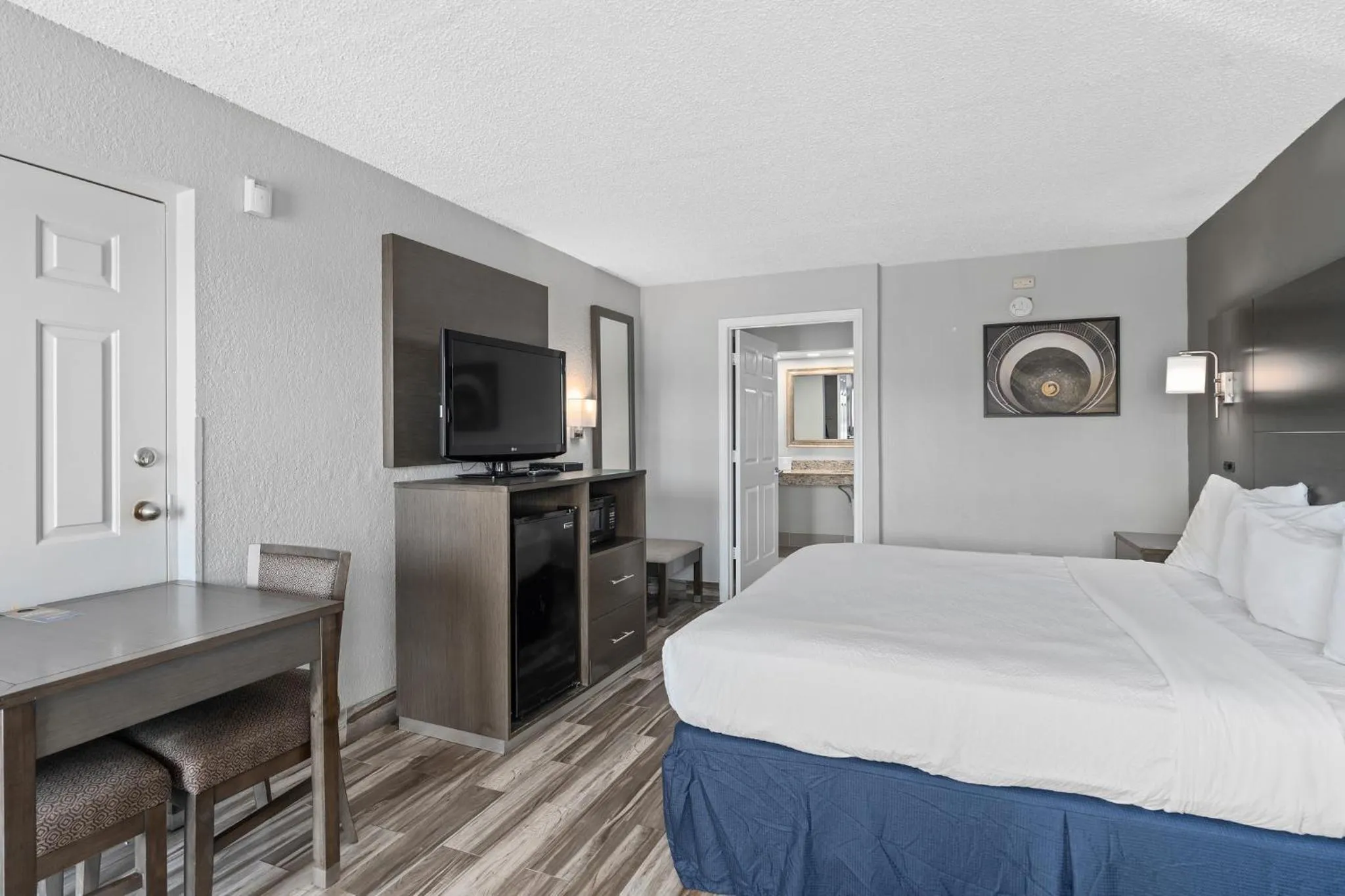Bed in Baymont by Wyndham Orlando East