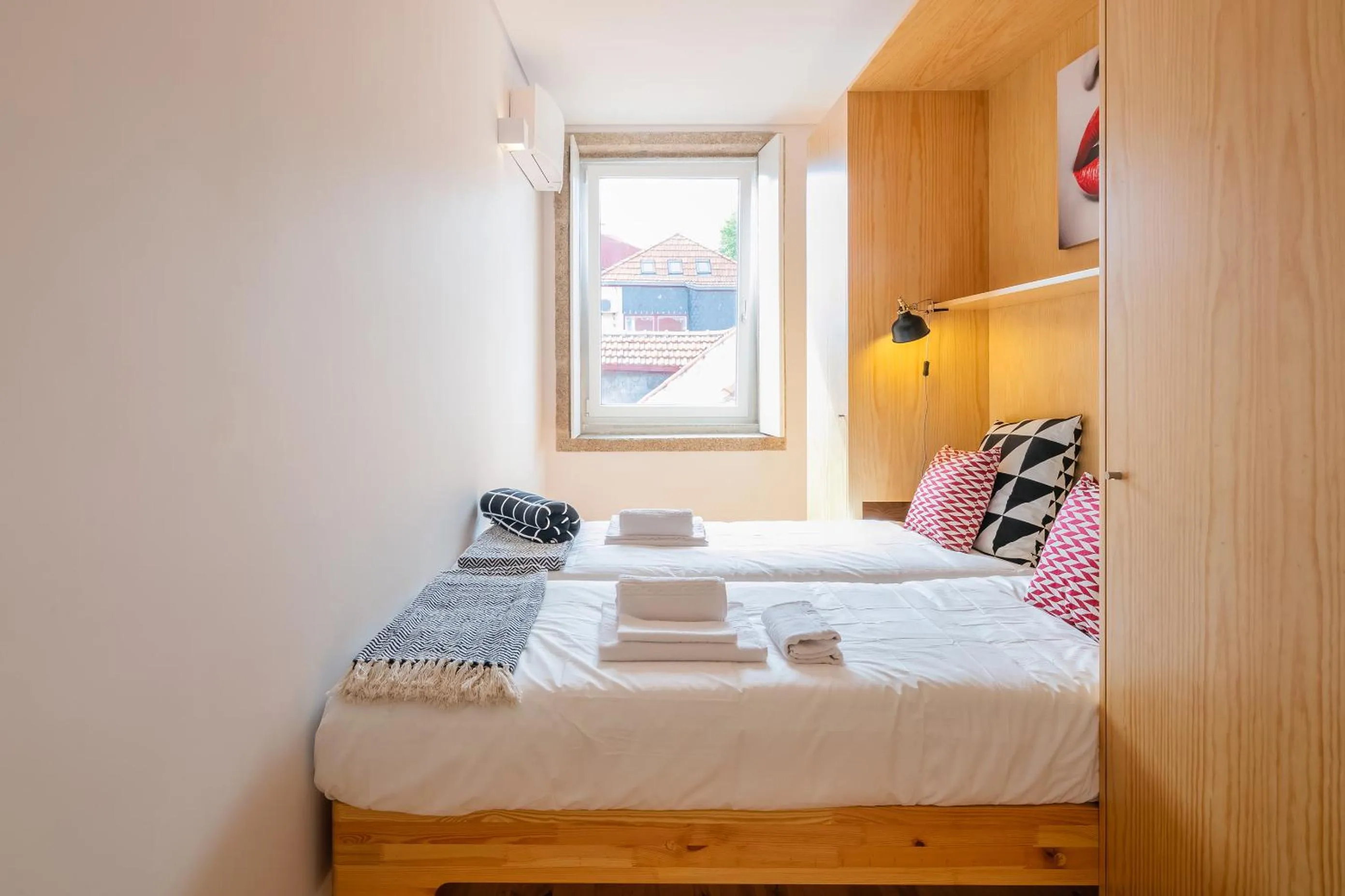 Bed in Indulge Porto Flats