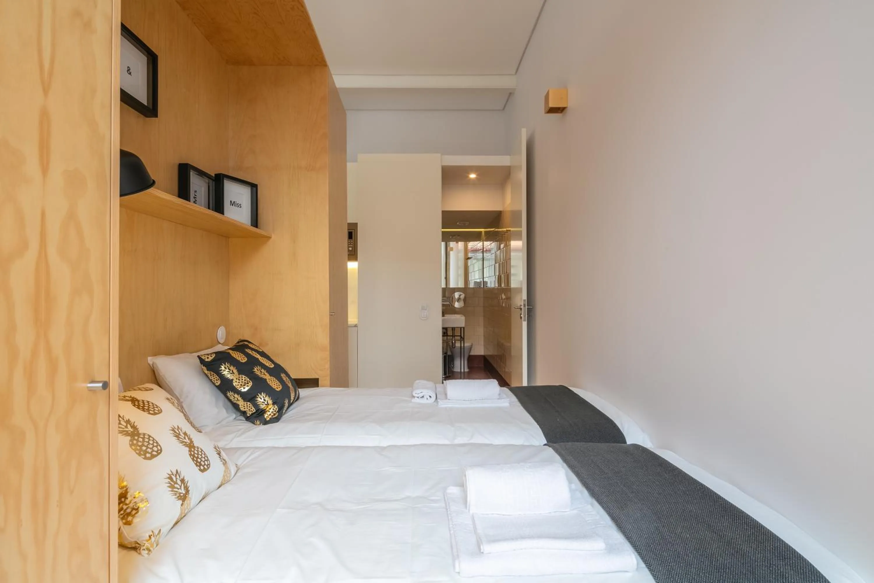 Bed in Indulge Porto Flats