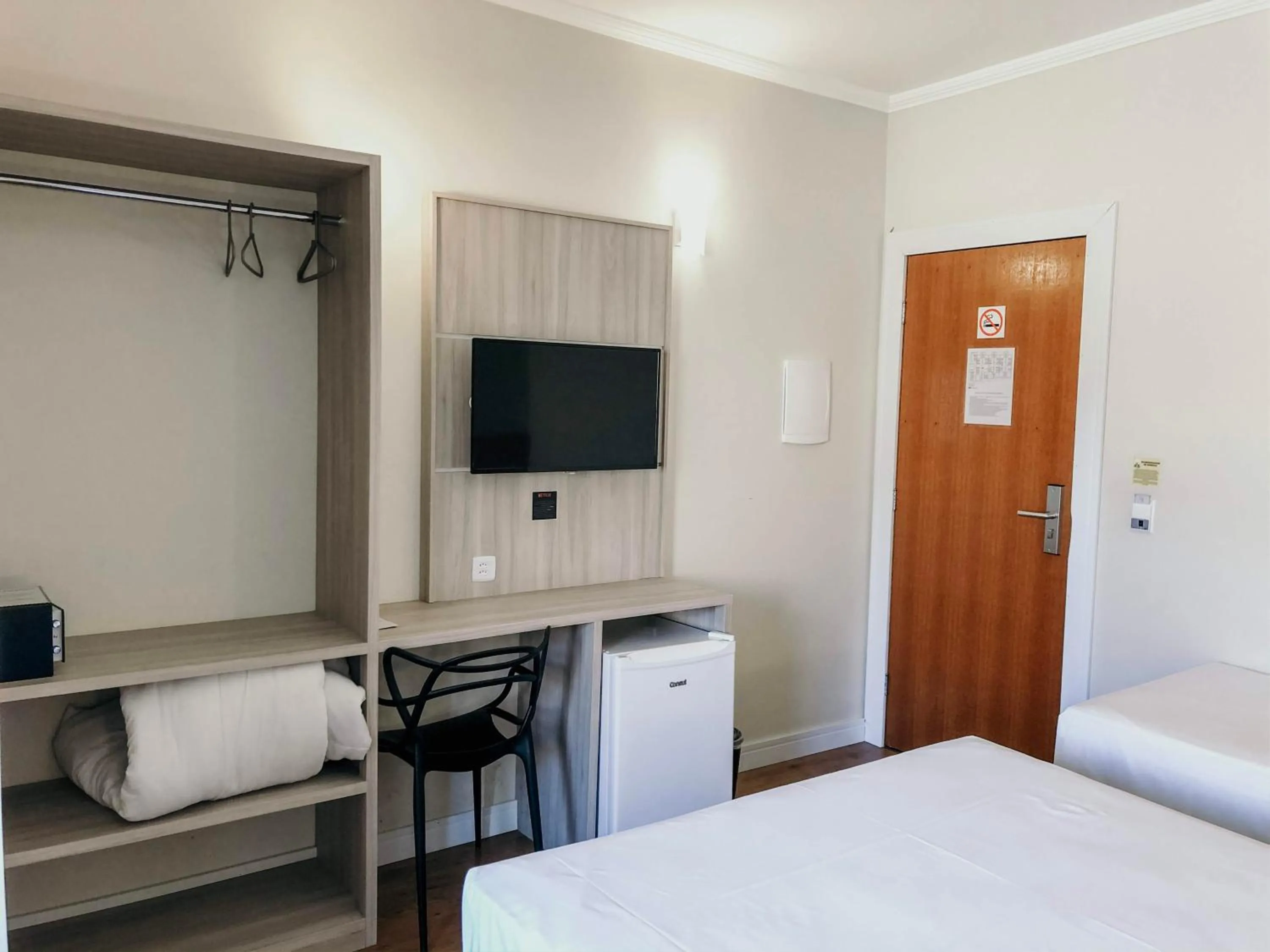 Photo of the whole room, Bed in Sense Hotel Araucária