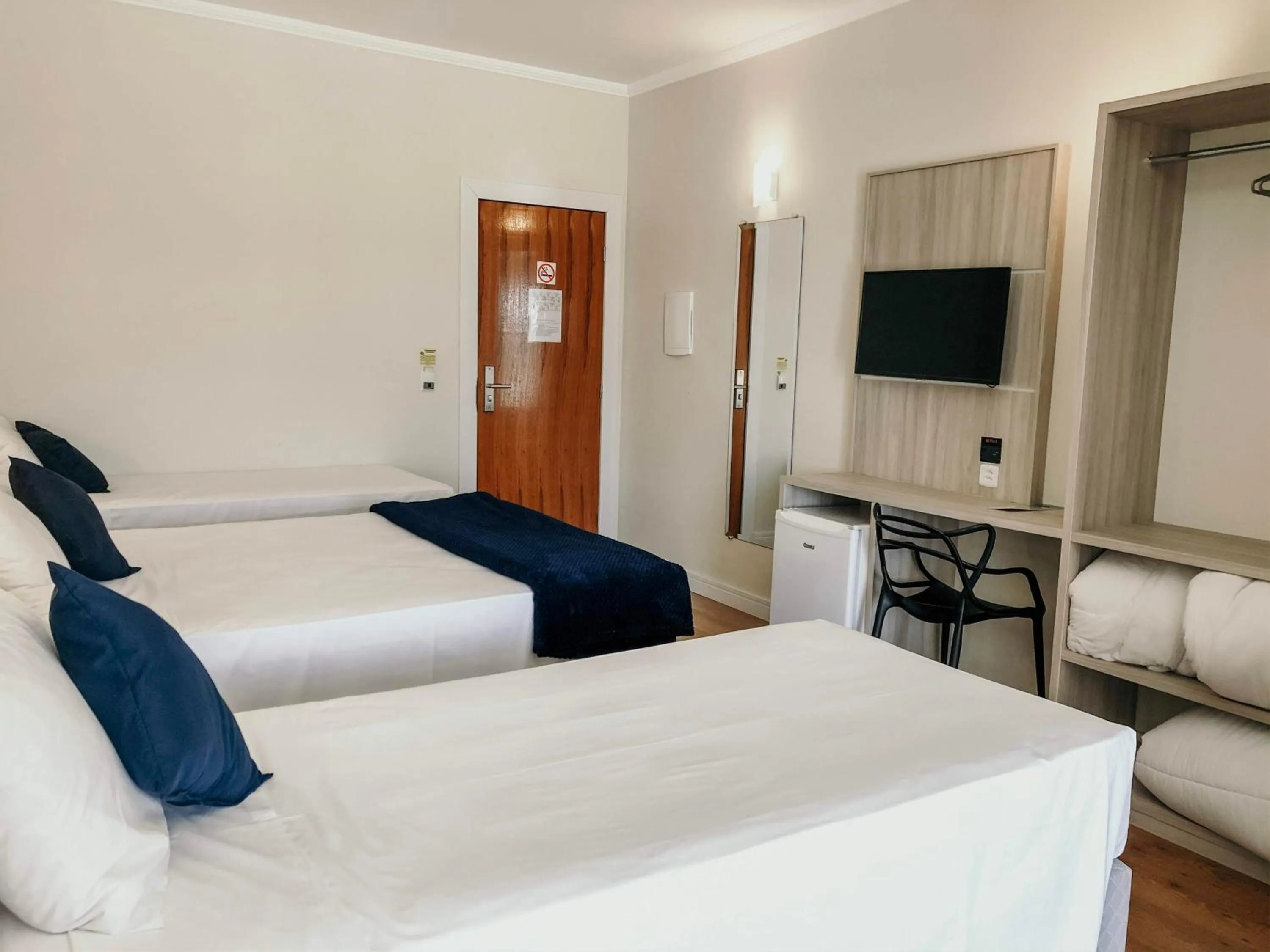 Photo of the whole room, Bed in Sense Hotel Araucária