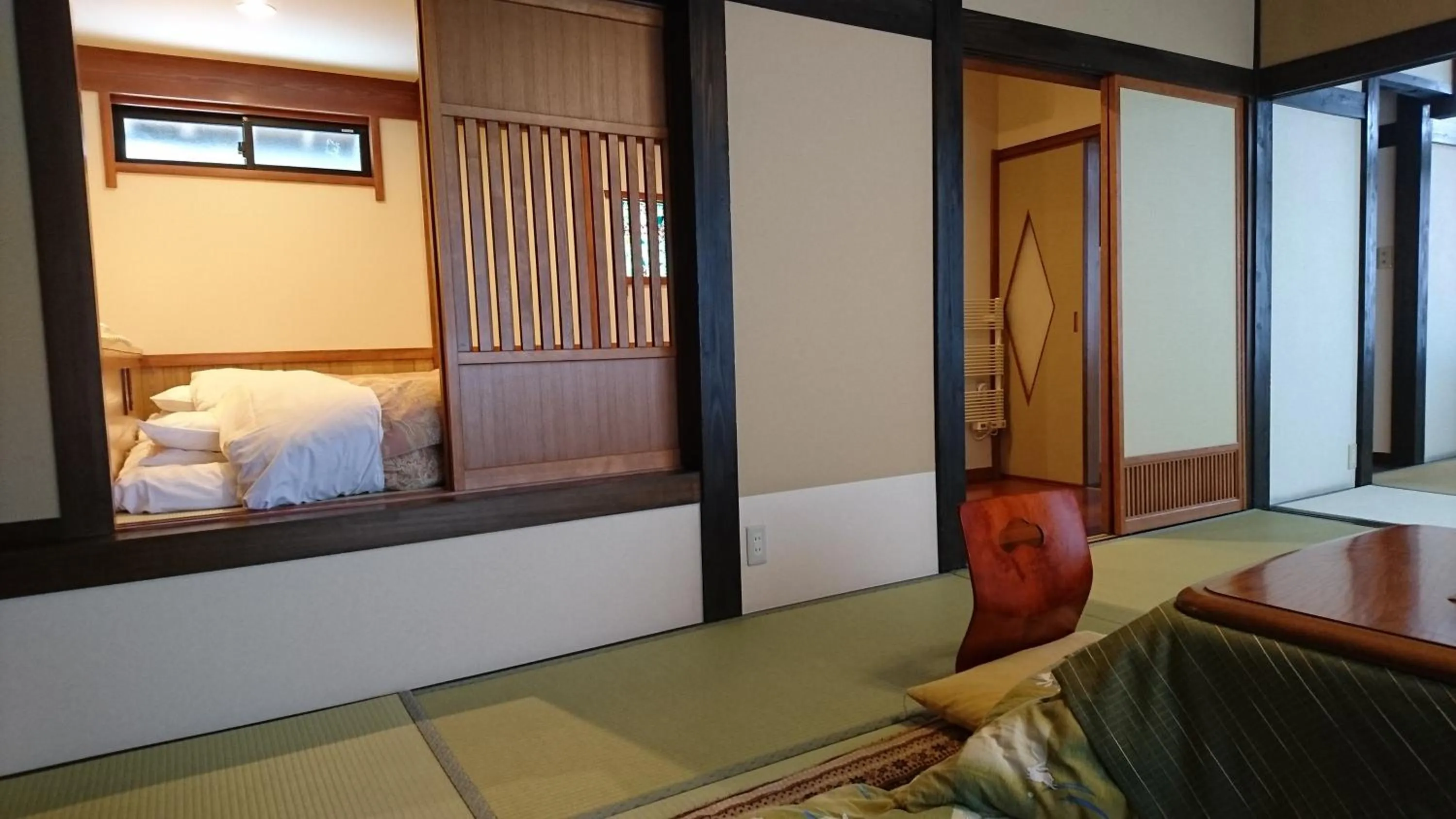 Photo of the whole room, Bed in Katsuragi no Sato