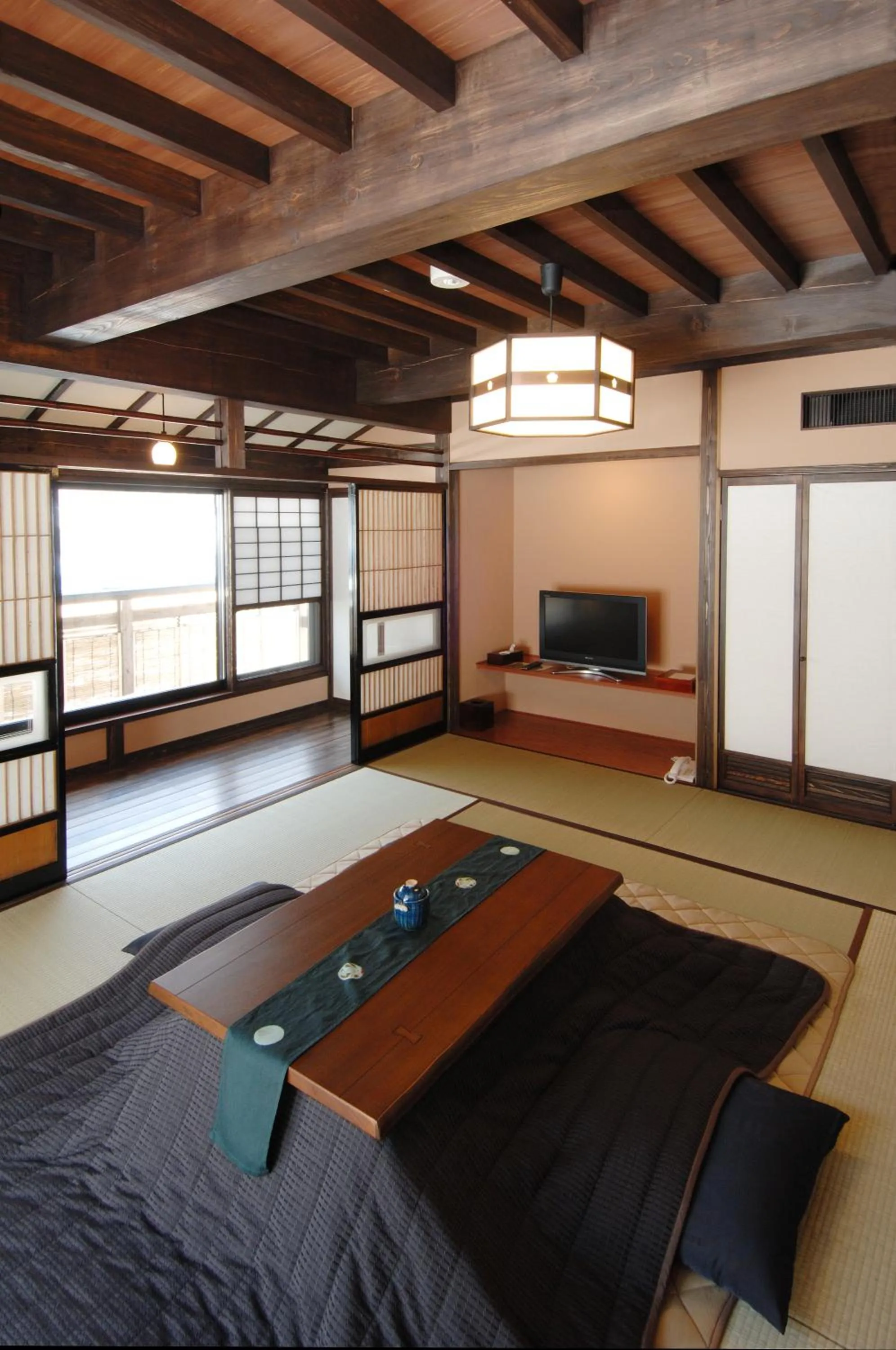 Photo of the whole room, Bed in Katsuragi no Sato