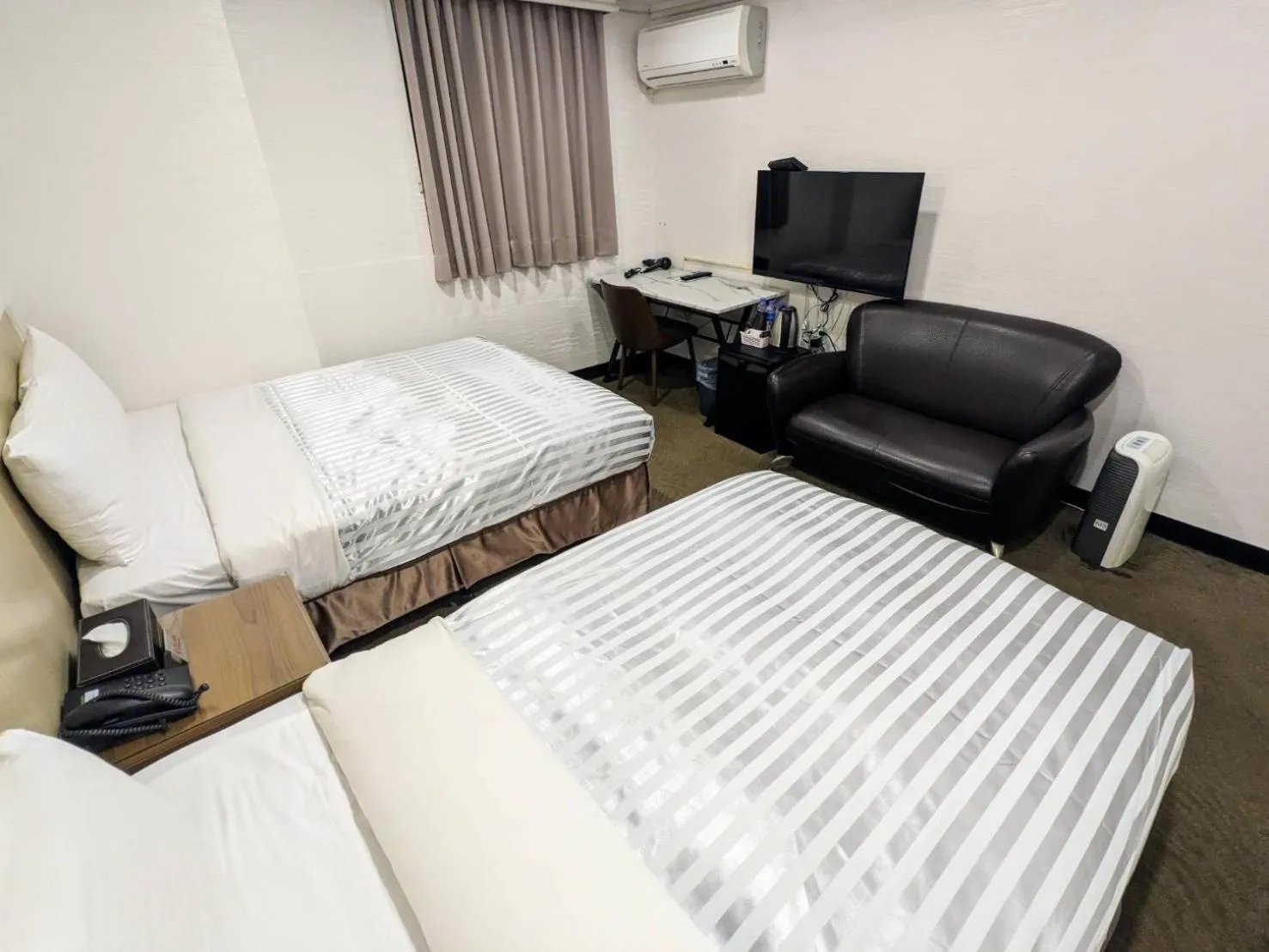 Bed in Ximen Hotel