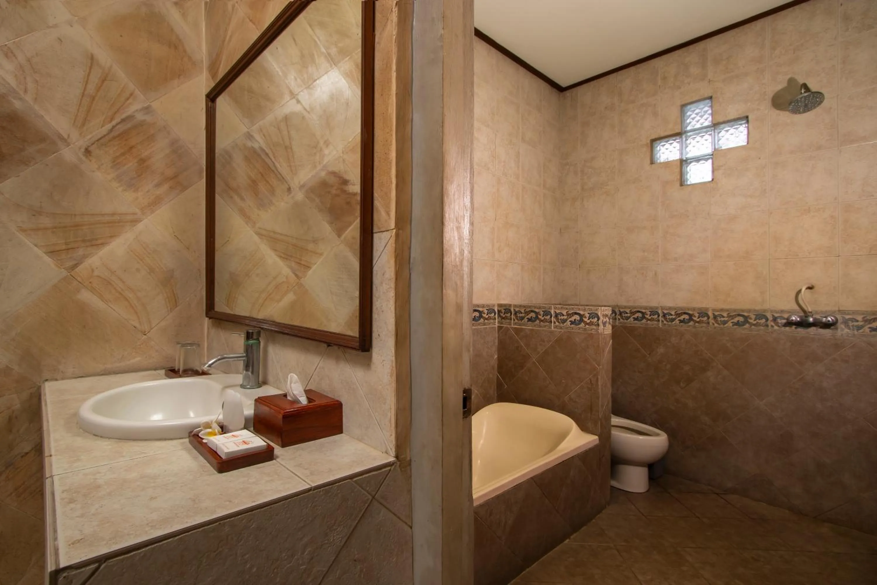 Bathroom in Suriwathi Hotel Legian