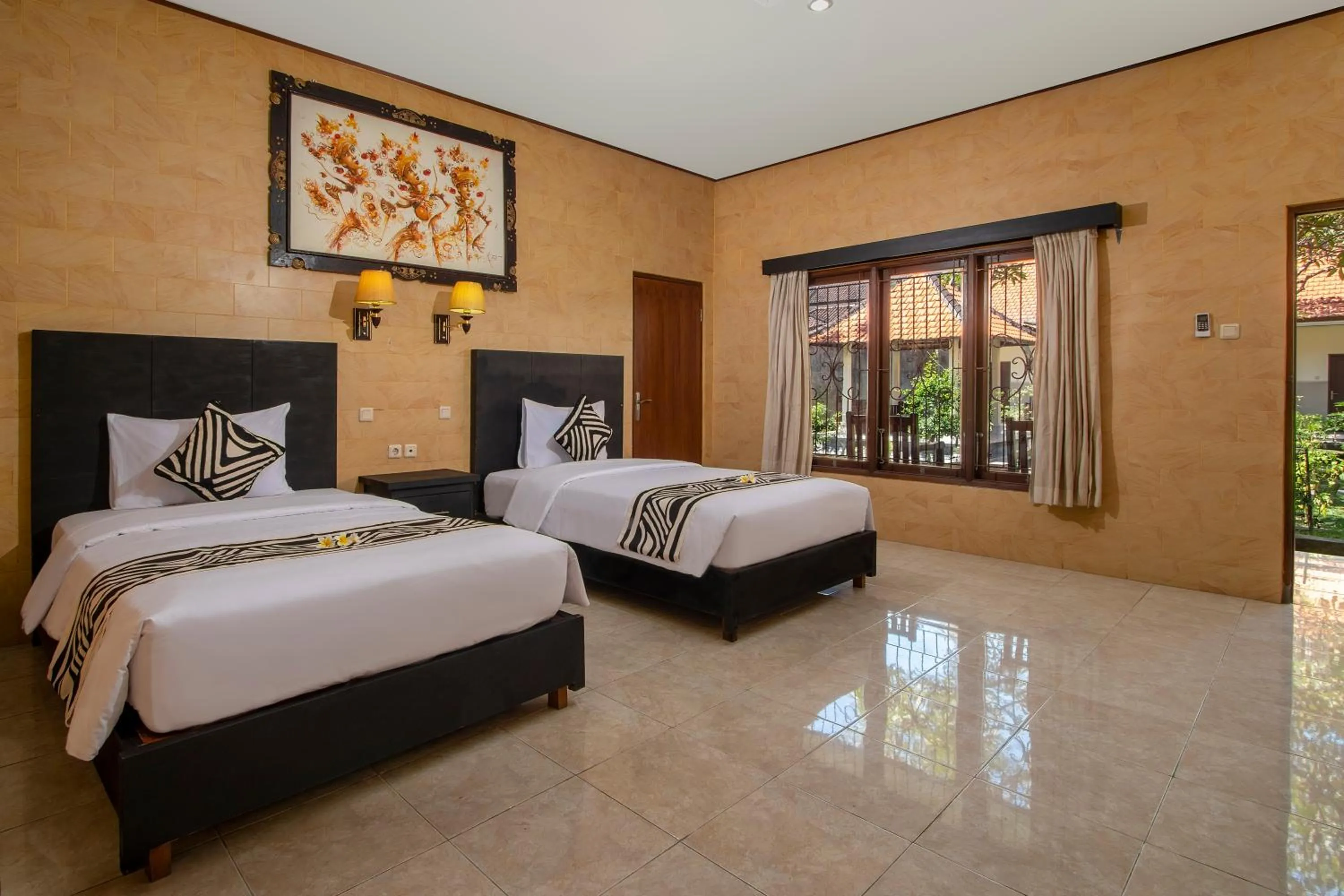 Bed in Suriwathi Hotel Legian