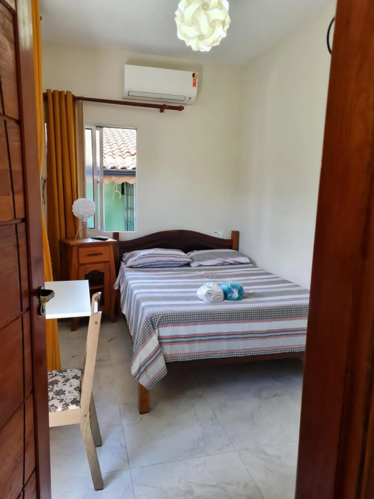 Bed in Pousada Reis Guarujá