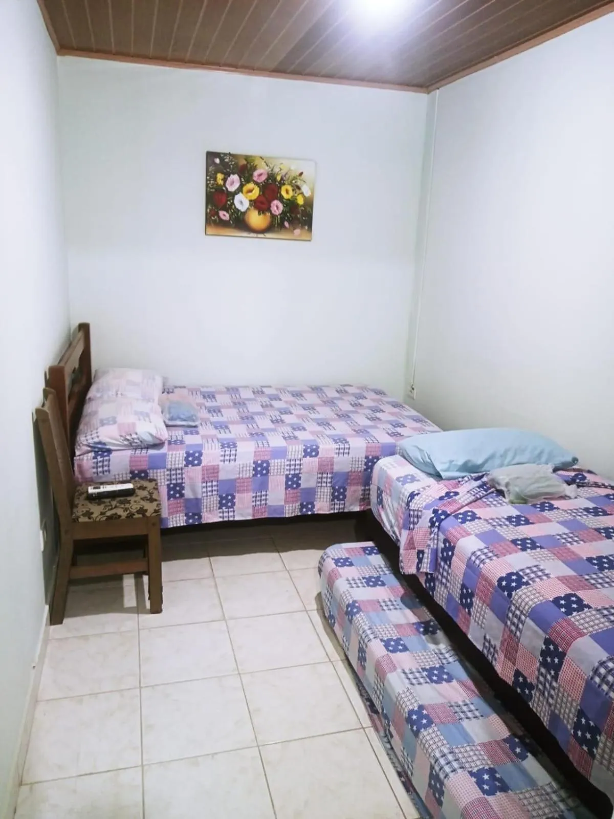 Bed in Pousada Reis Guarujá