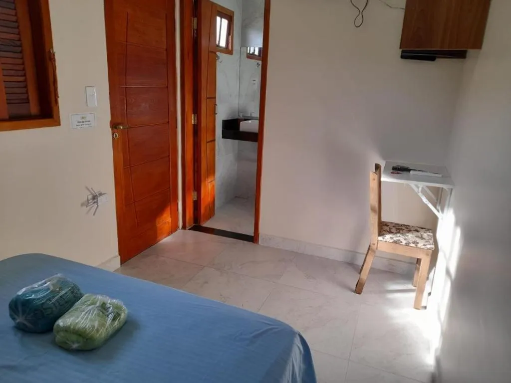 Bed in Pousada Reis Guarujá