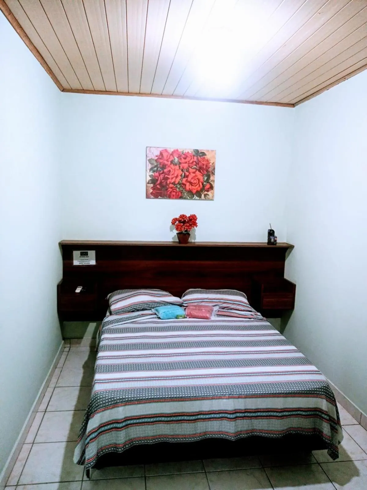 Bed in Pousada Reis Guarujá