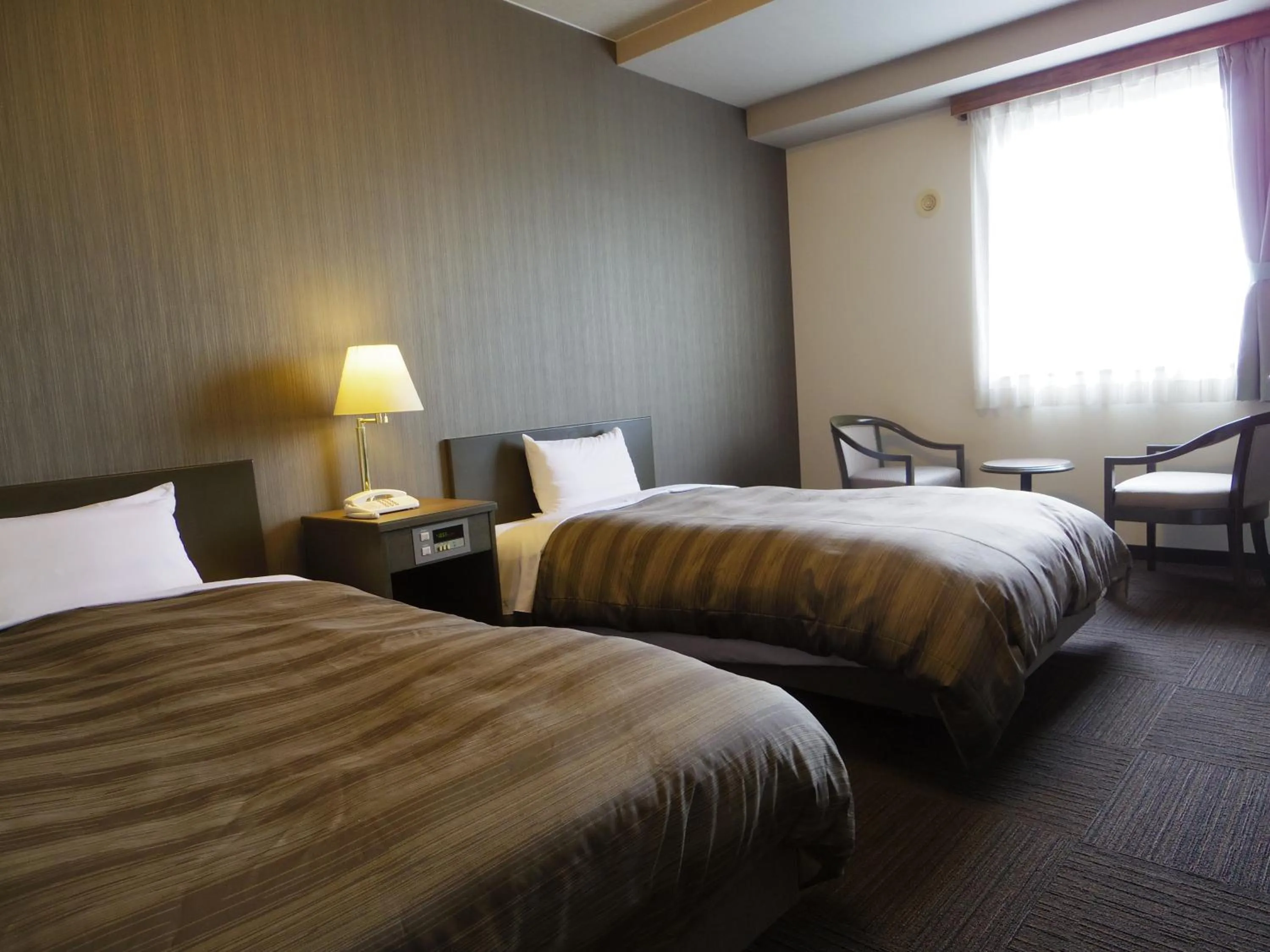 Photo of the whole room, Bed in Hotel Route-Inn Iida