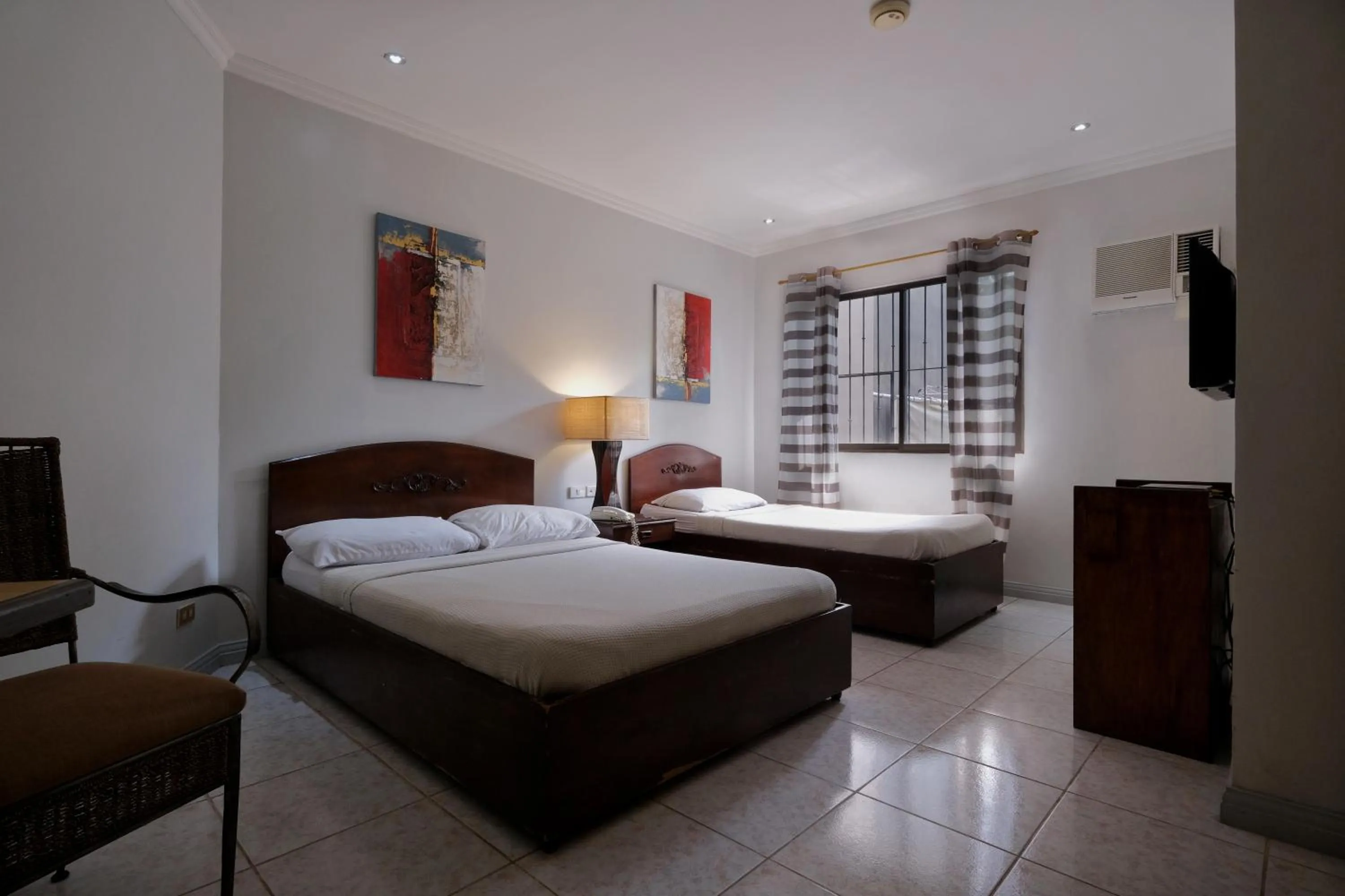 Photo of the whole room, Bed in Palazzo Pensionne