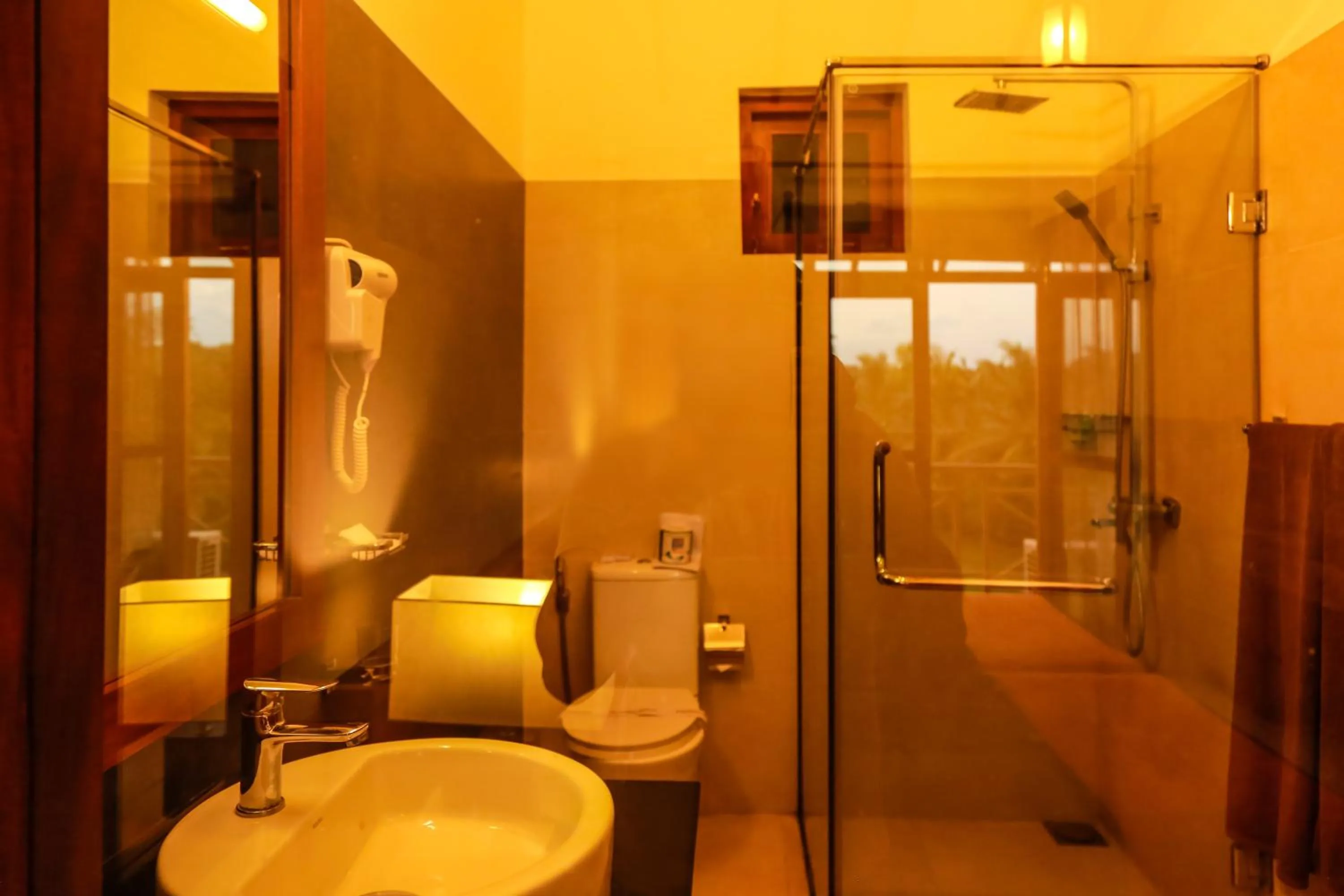 Bathroom in Pelwehera Village Resort