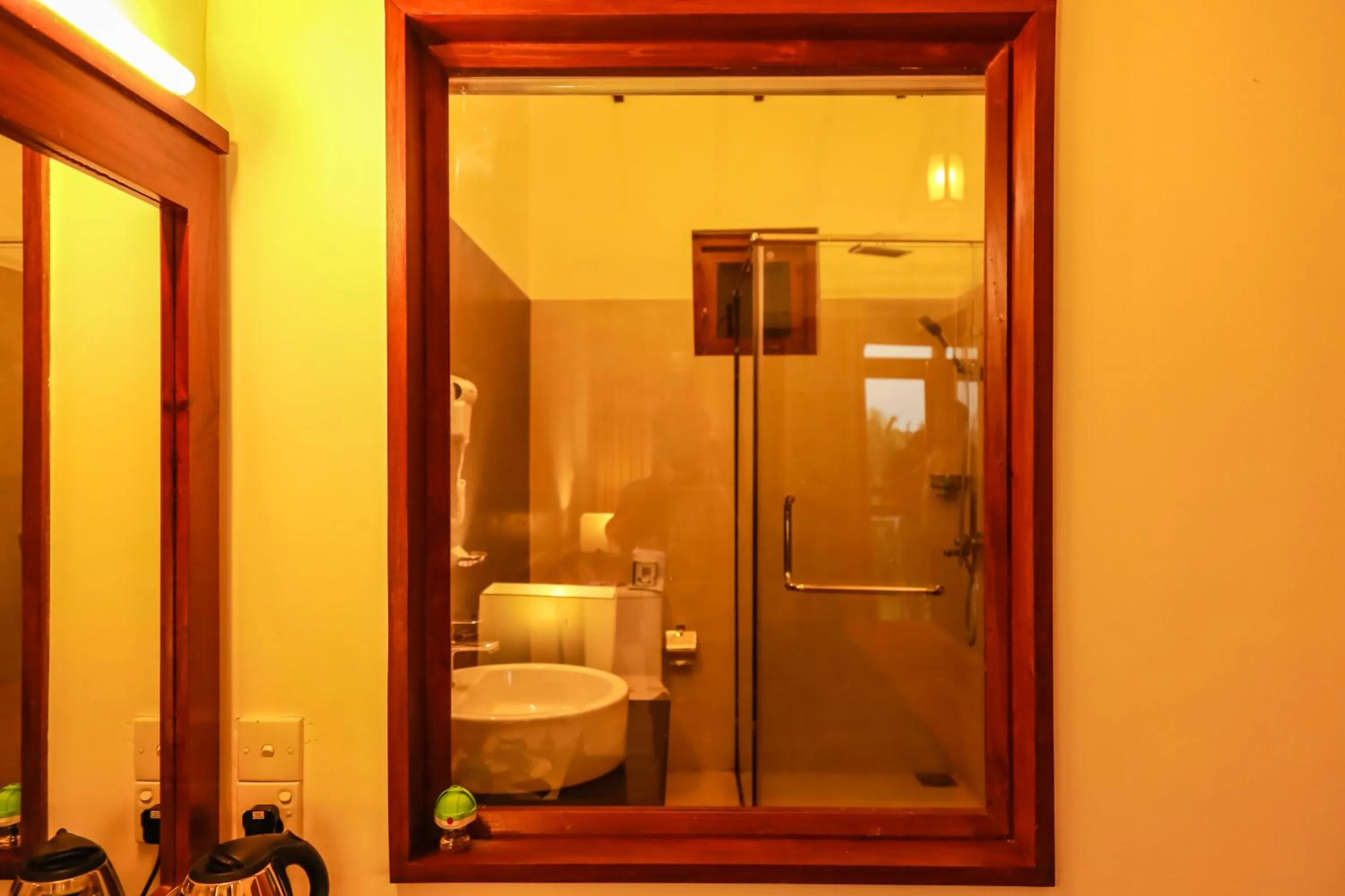 Bathroom in Pelwehera Village Resort