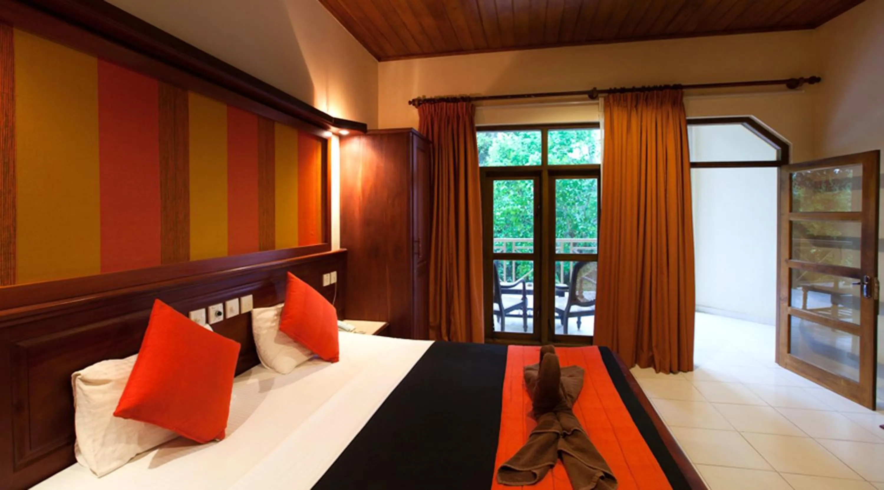 Balcony/Terrace, Bed in Pelwehera Village Resort