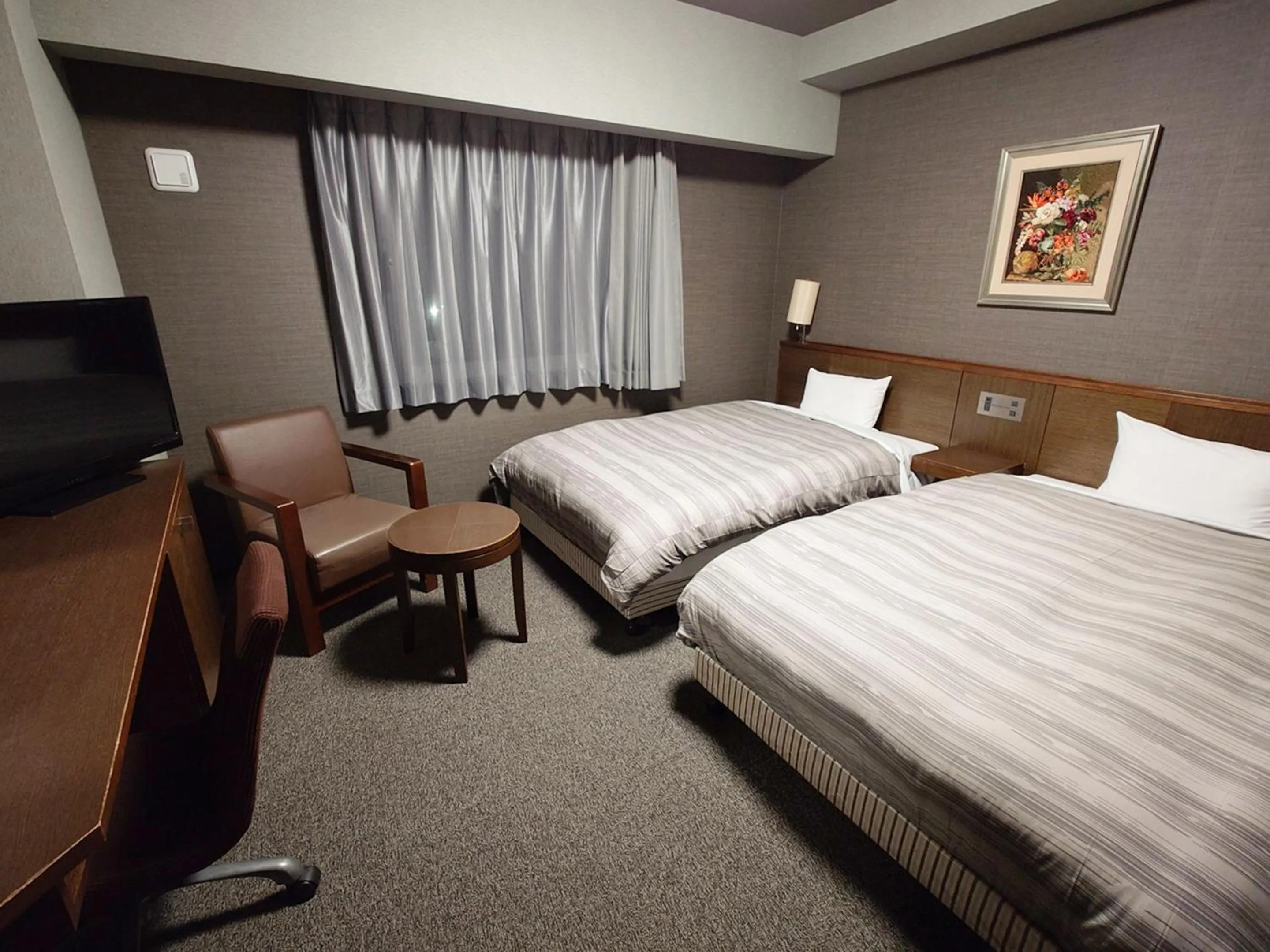 Photo of the whole room, Bed in Hotel Route-Inn Handakamezaki