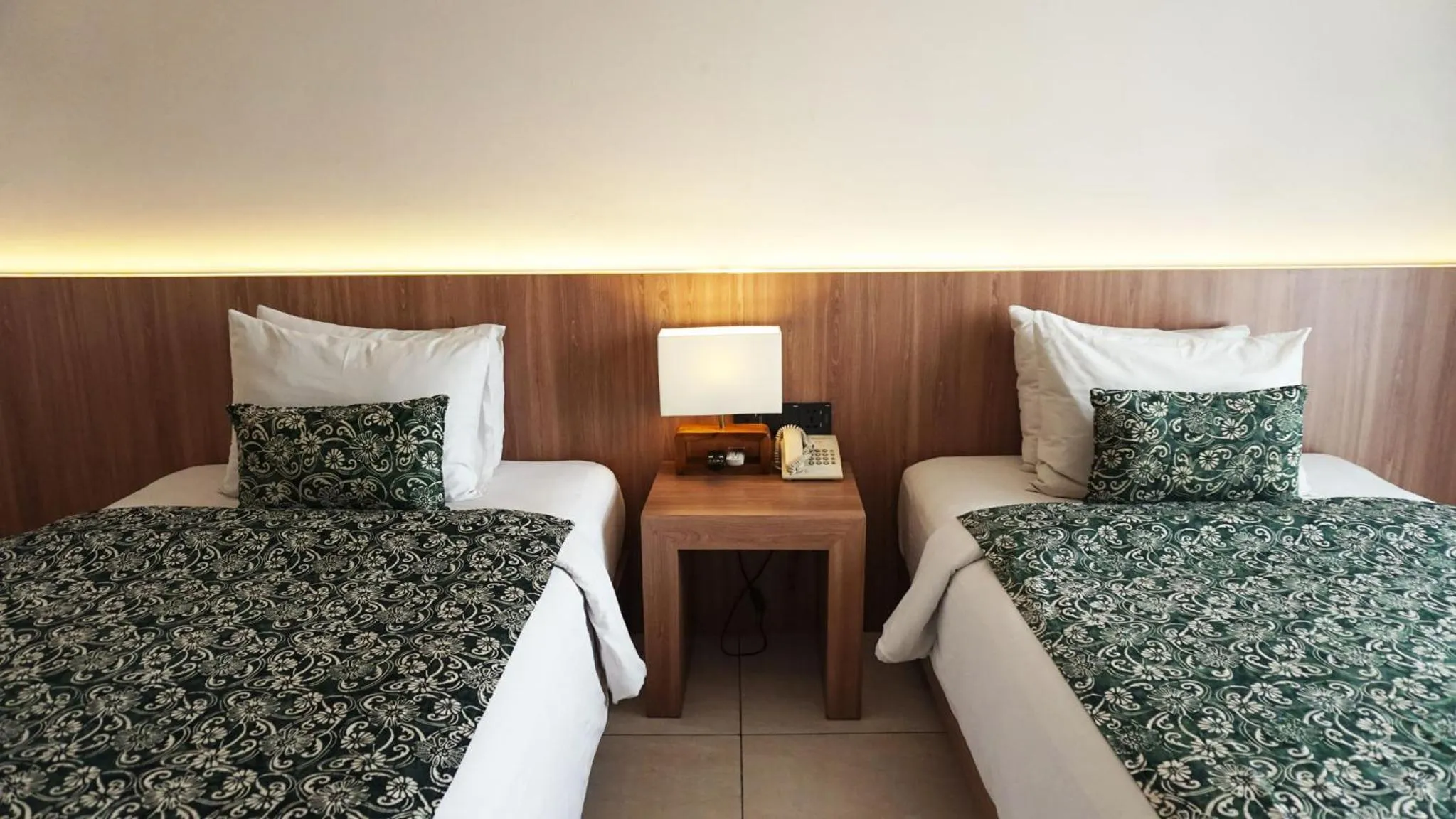 Bed in Tusita Boutique Hotel