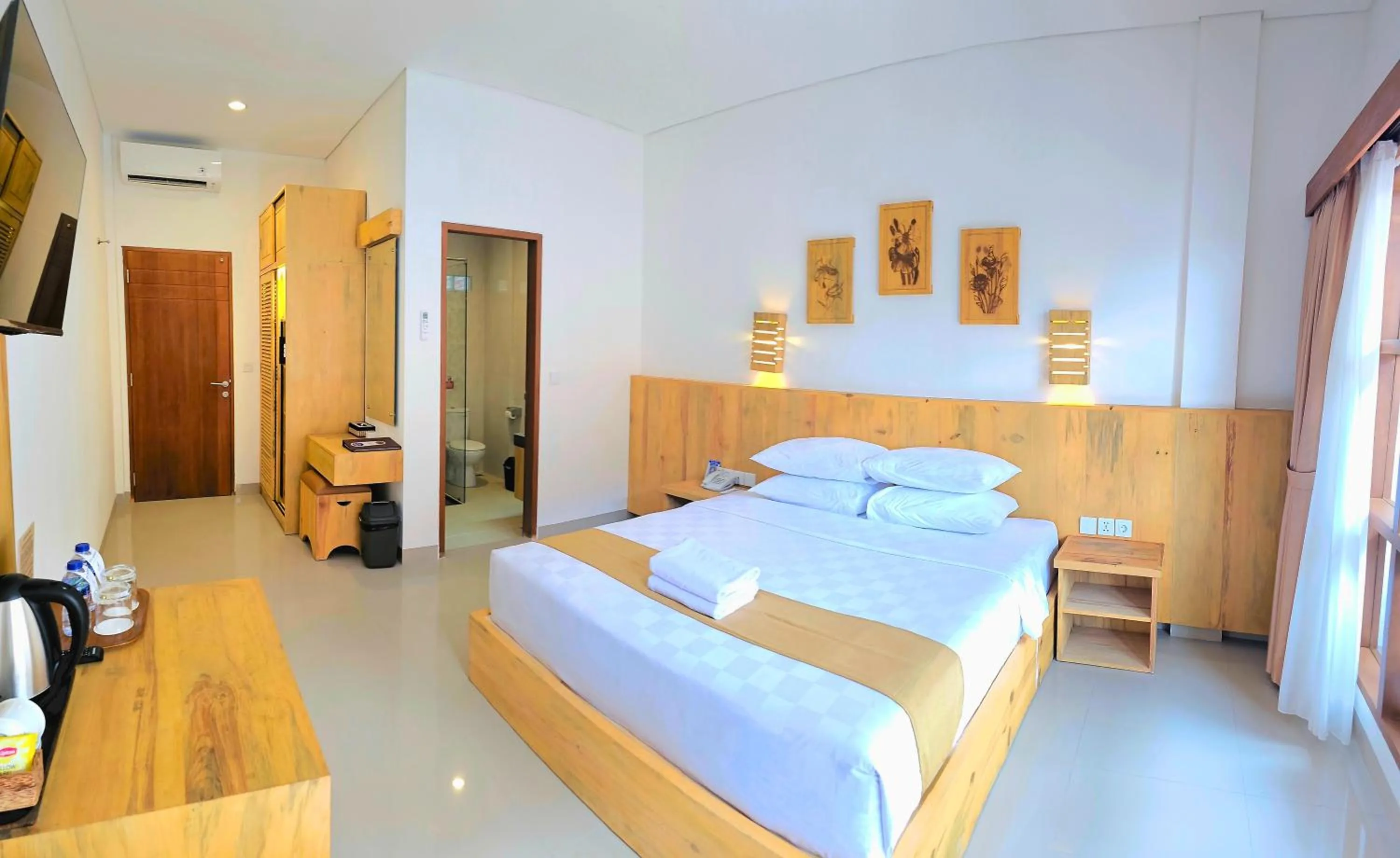 Bedroom, Bed in Satriya Cottages