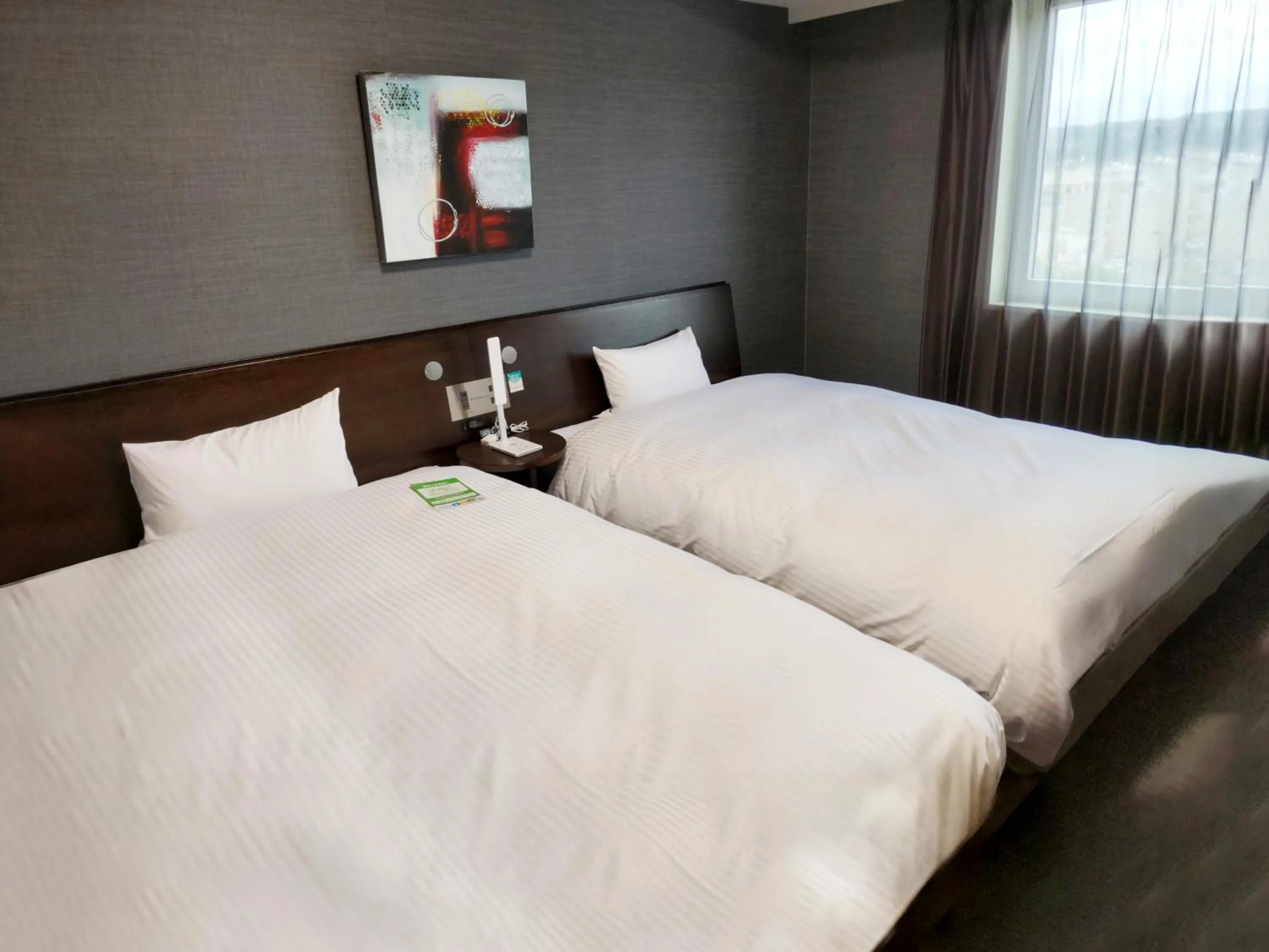 Photo of the whole room, Bed in Hotel Route-Inn Ena