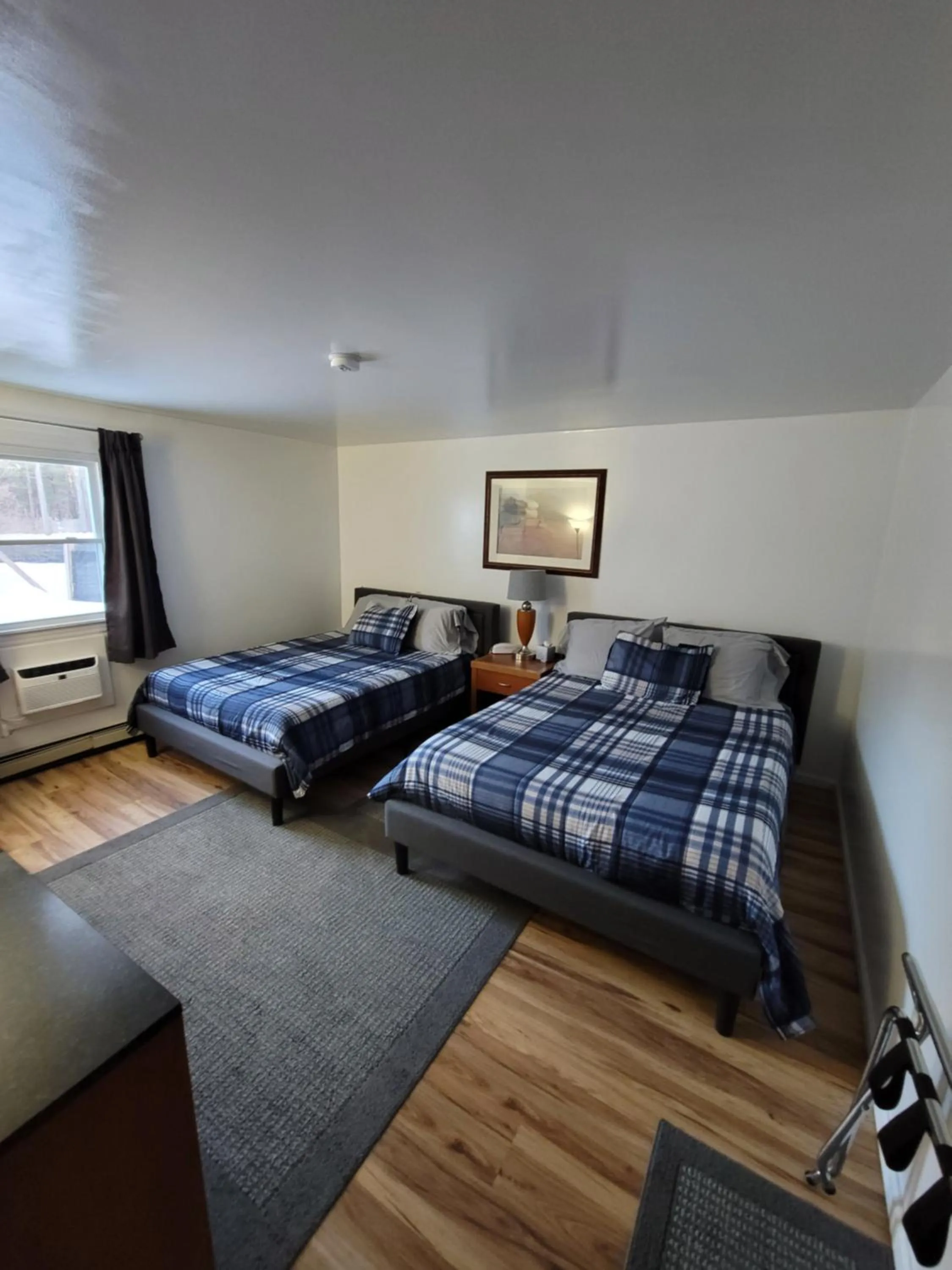 Bed in West Bethel Motel