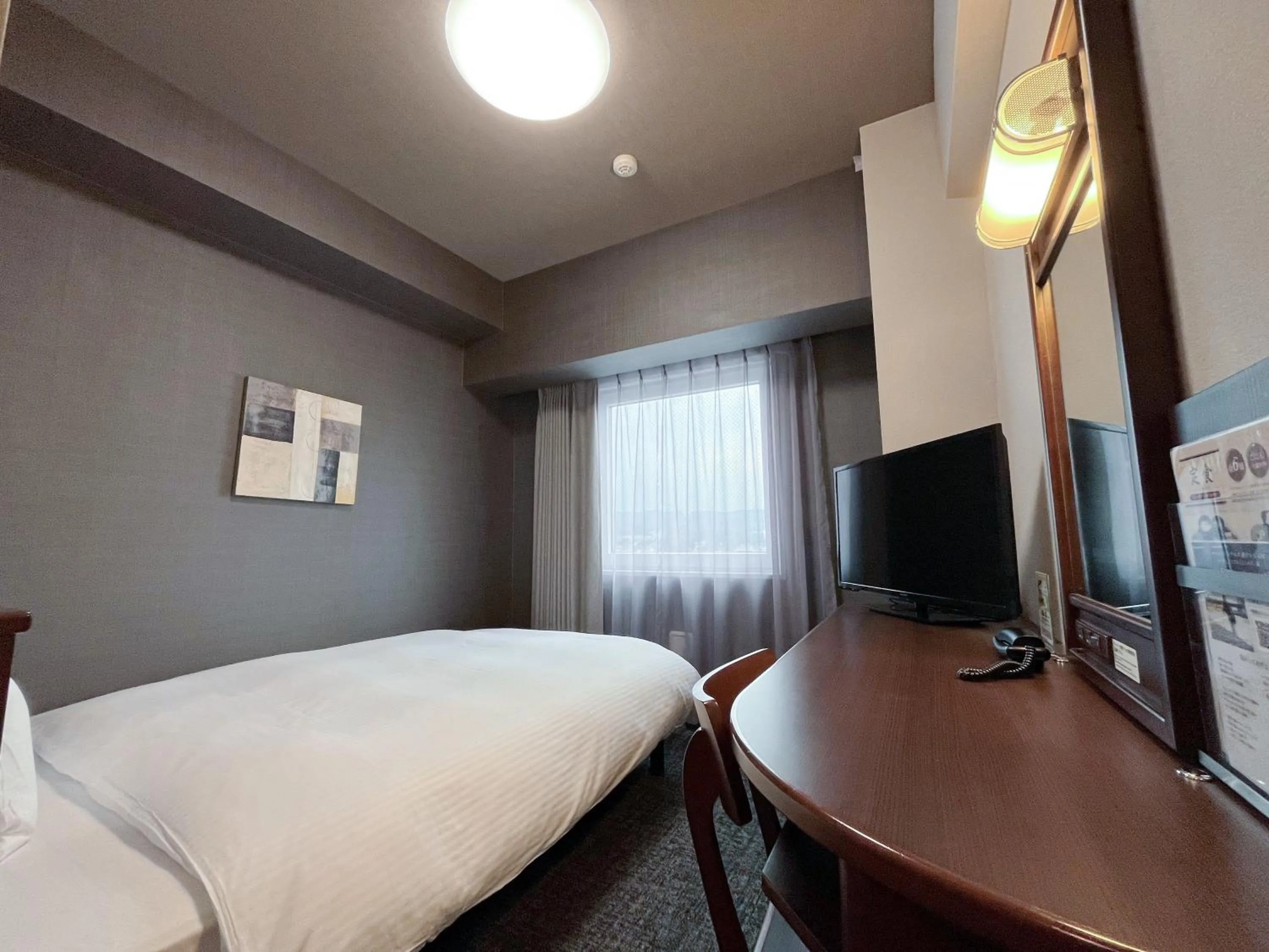 Photo of the whole room, Bed in Hotel Route-Inn Toki
