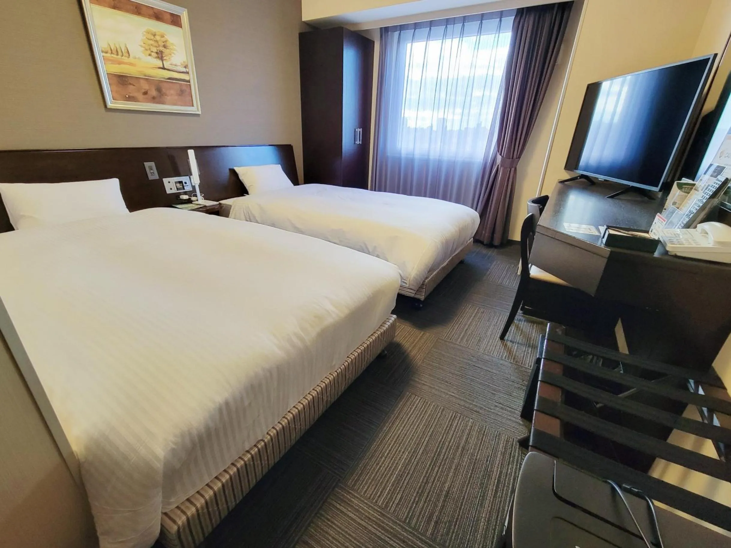 Photo of the whole room, Bed in Hotel Route-Inn Toyotajinnaka