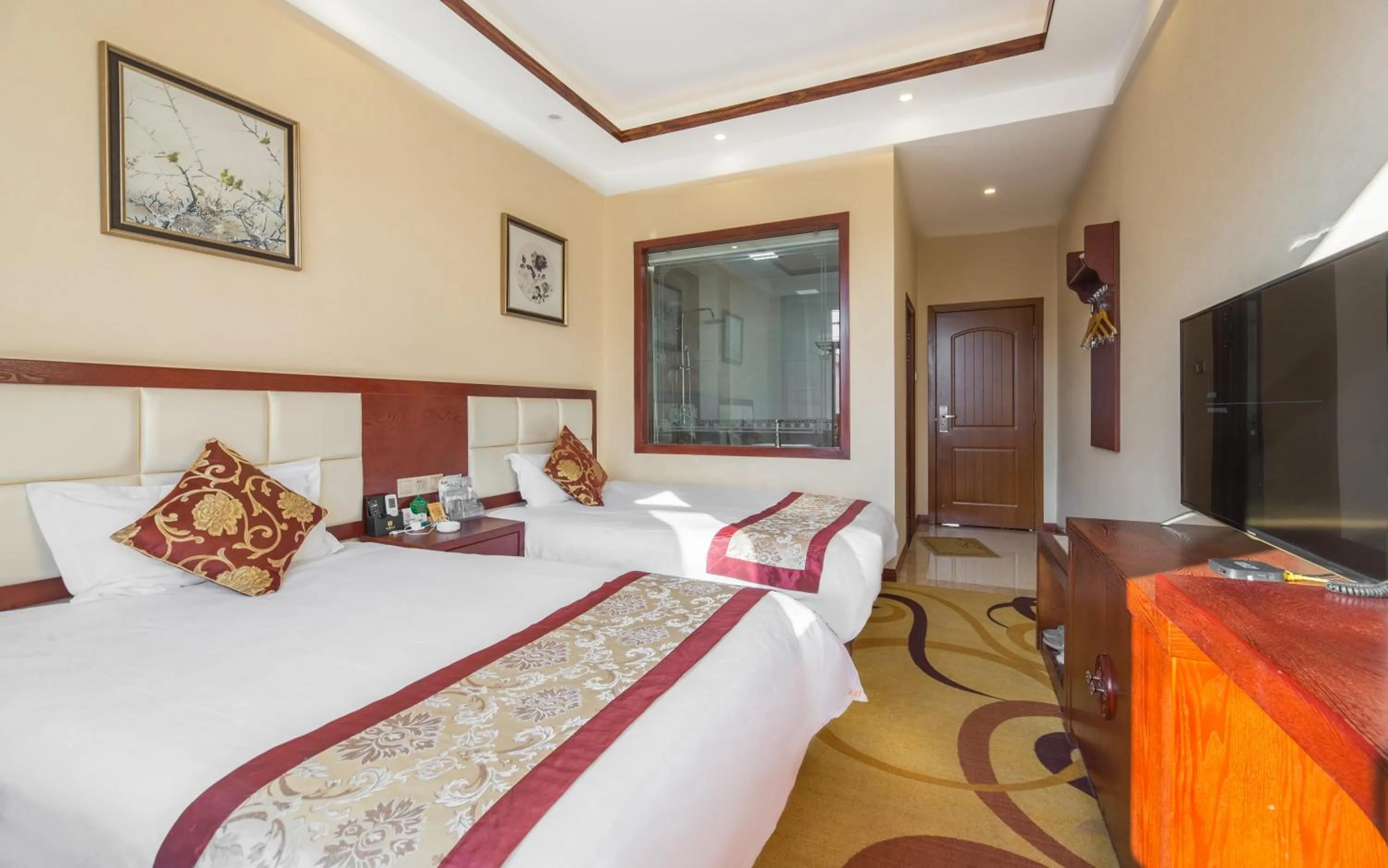 Photo of the whole room, Bed in Binchuan Shuang Long Hotel