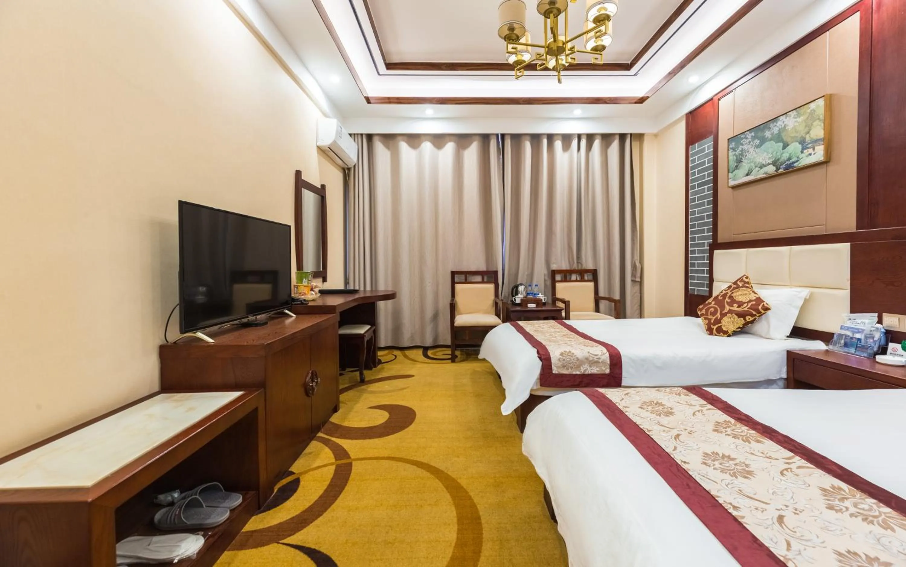 Photo of the whole room, Bed in Binchuan Shuang Long Hotel