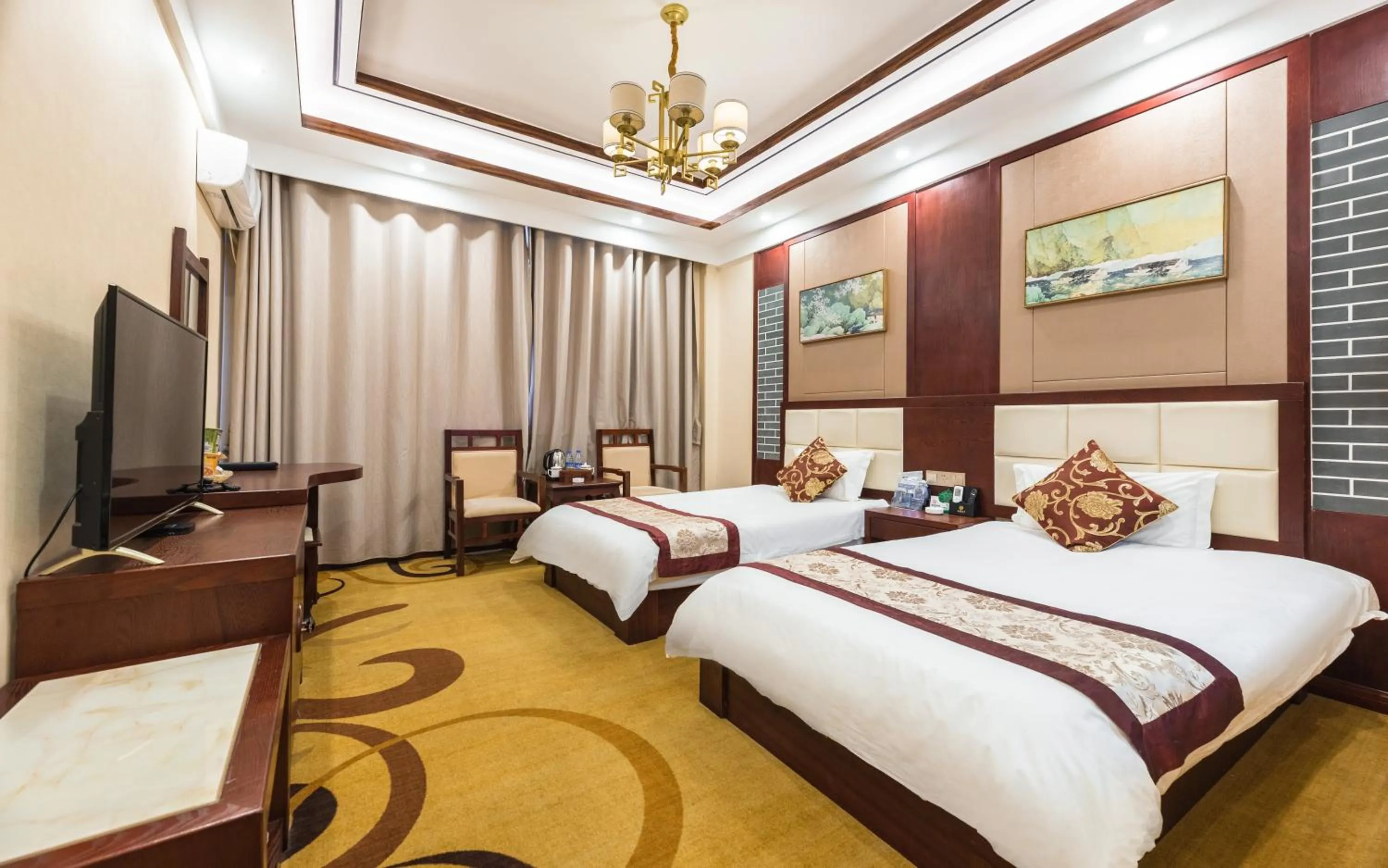Photo of the whole room, Bed in Binchuan Shuang Long Hotel