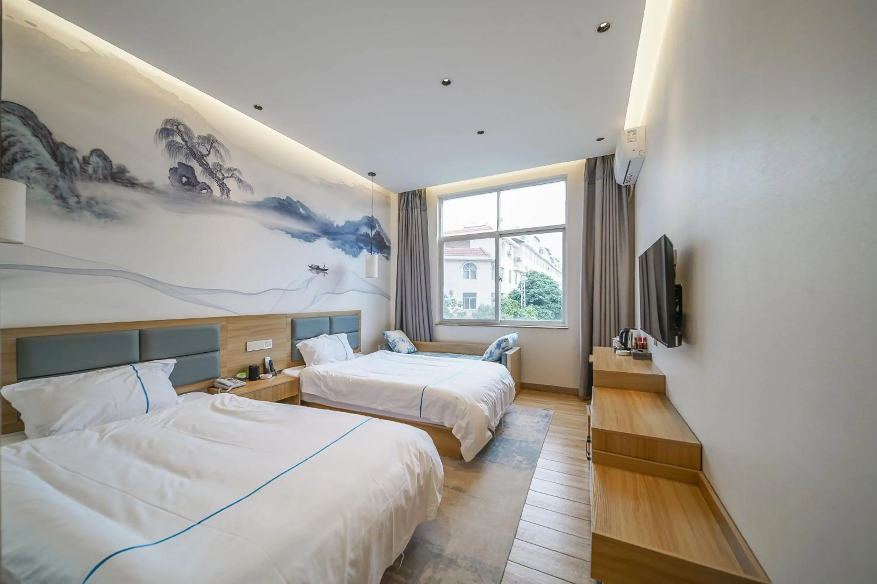 Bed in Binchuan Shuang Long Hotel