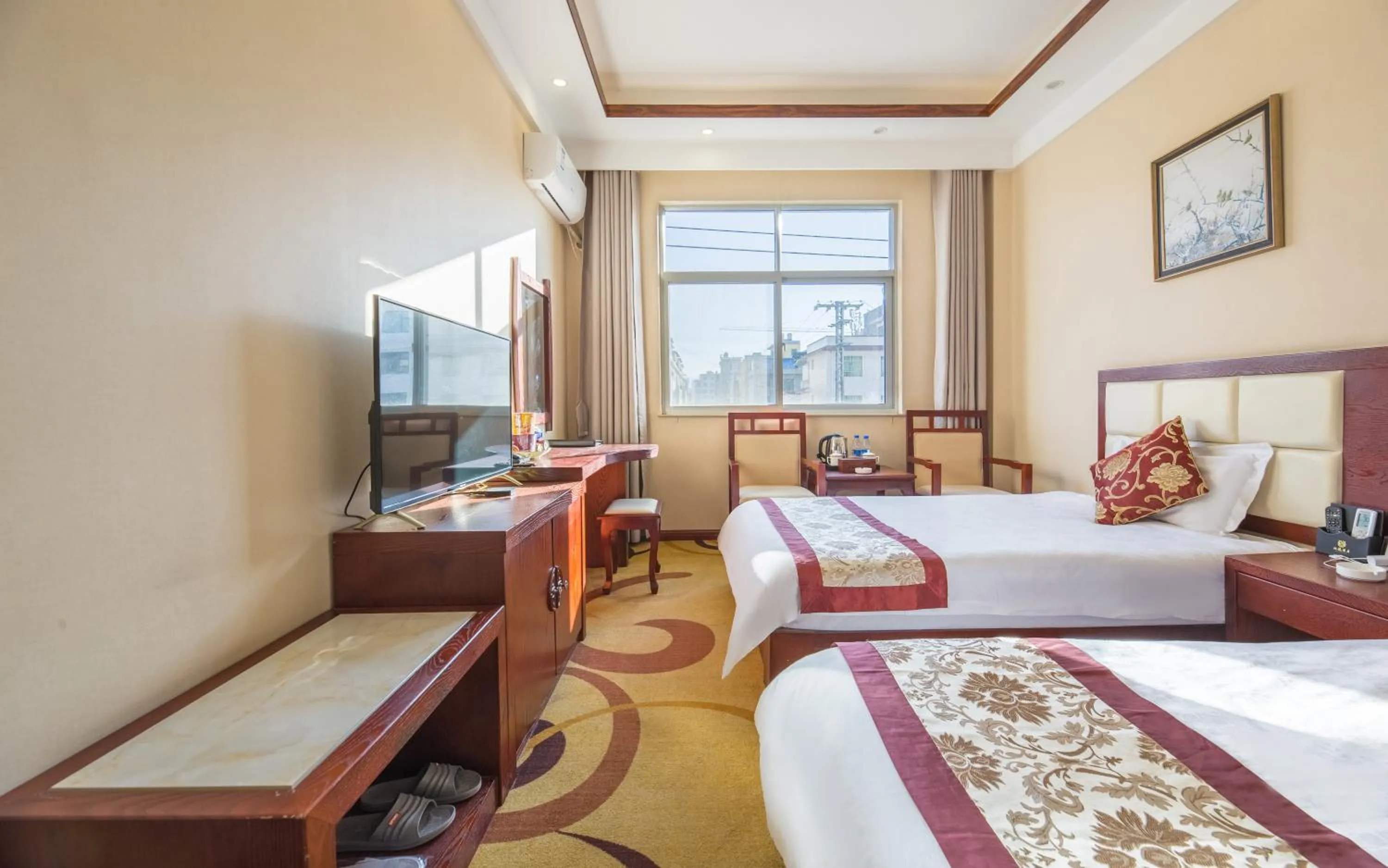 Photo of the whole room, Bed in Binchuan Shuang Long Hotel