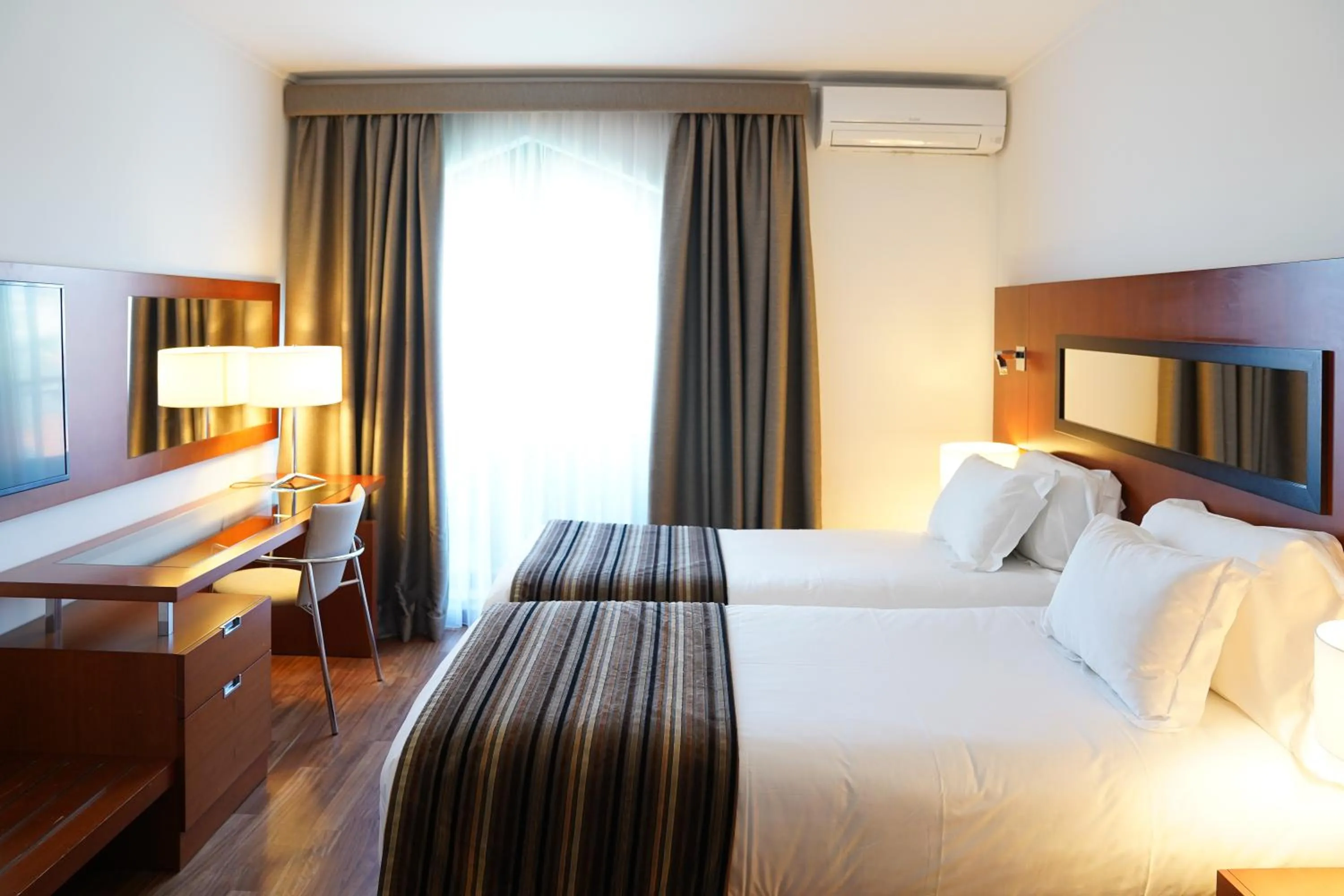 Bed in Legendary Lisboa Suites