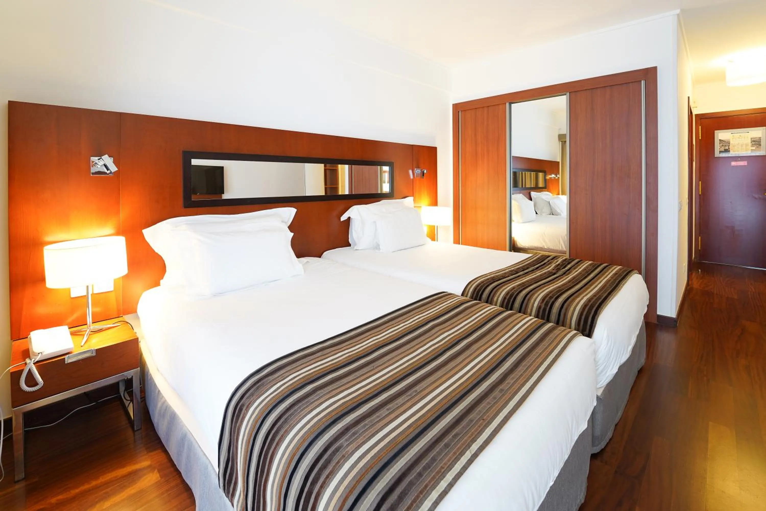 Bed in Legendary Lisboa Suites