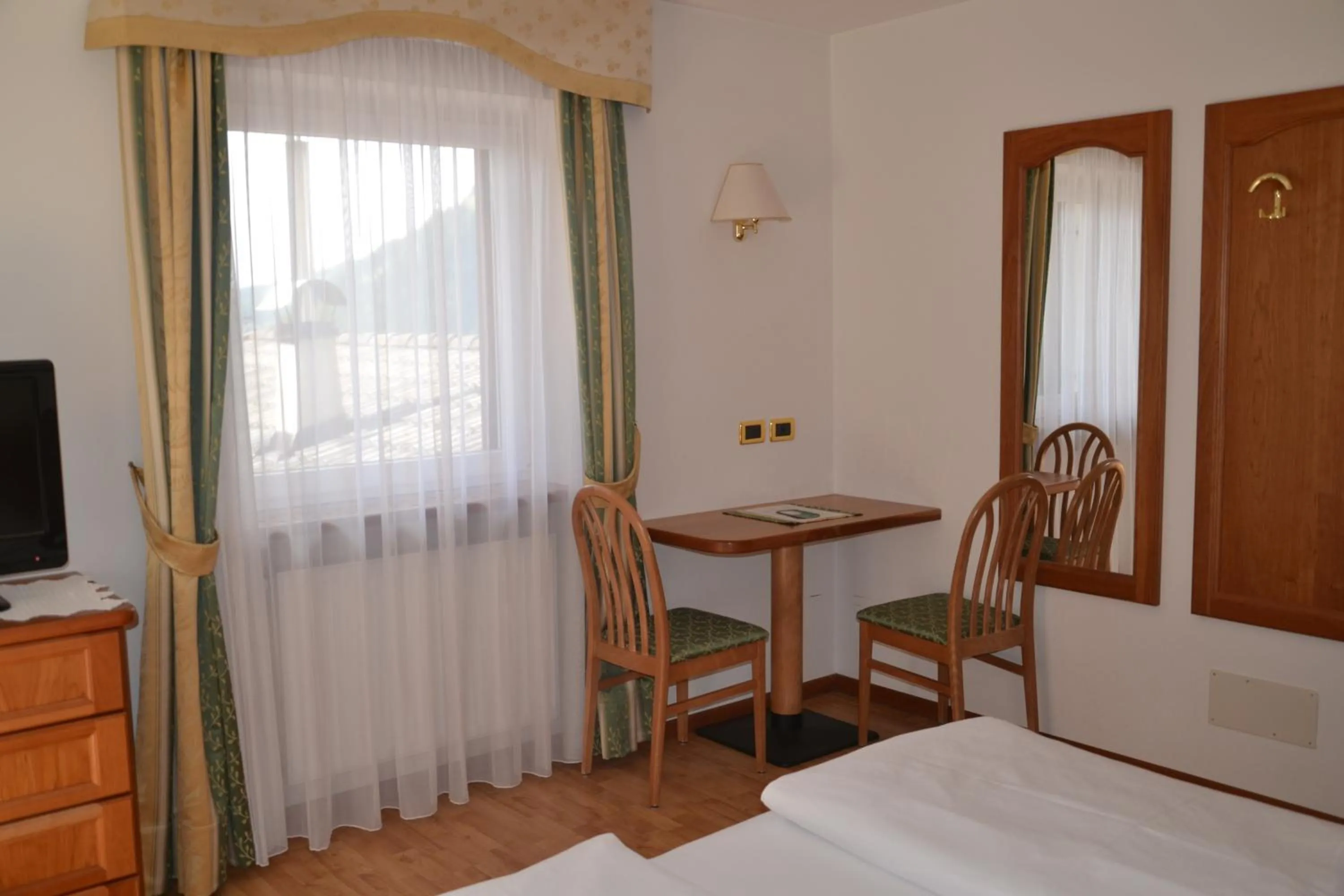 Decorative detail, Bed in Hotel Scoiattolo