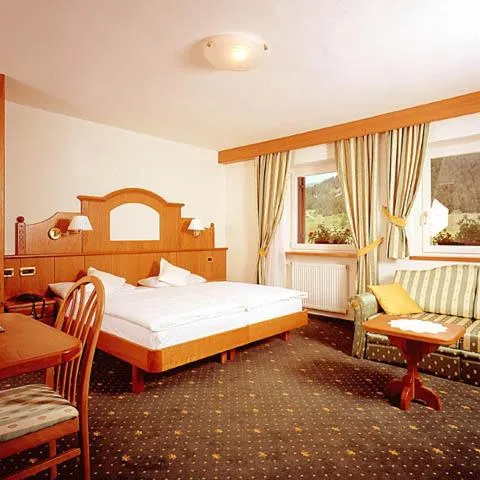 Bed in Hotel Scoiattolo