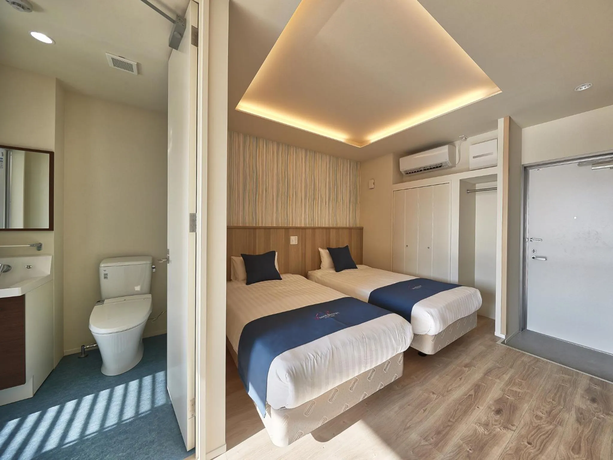 Photo of the whole room, Bed in Marea Resort Motobu