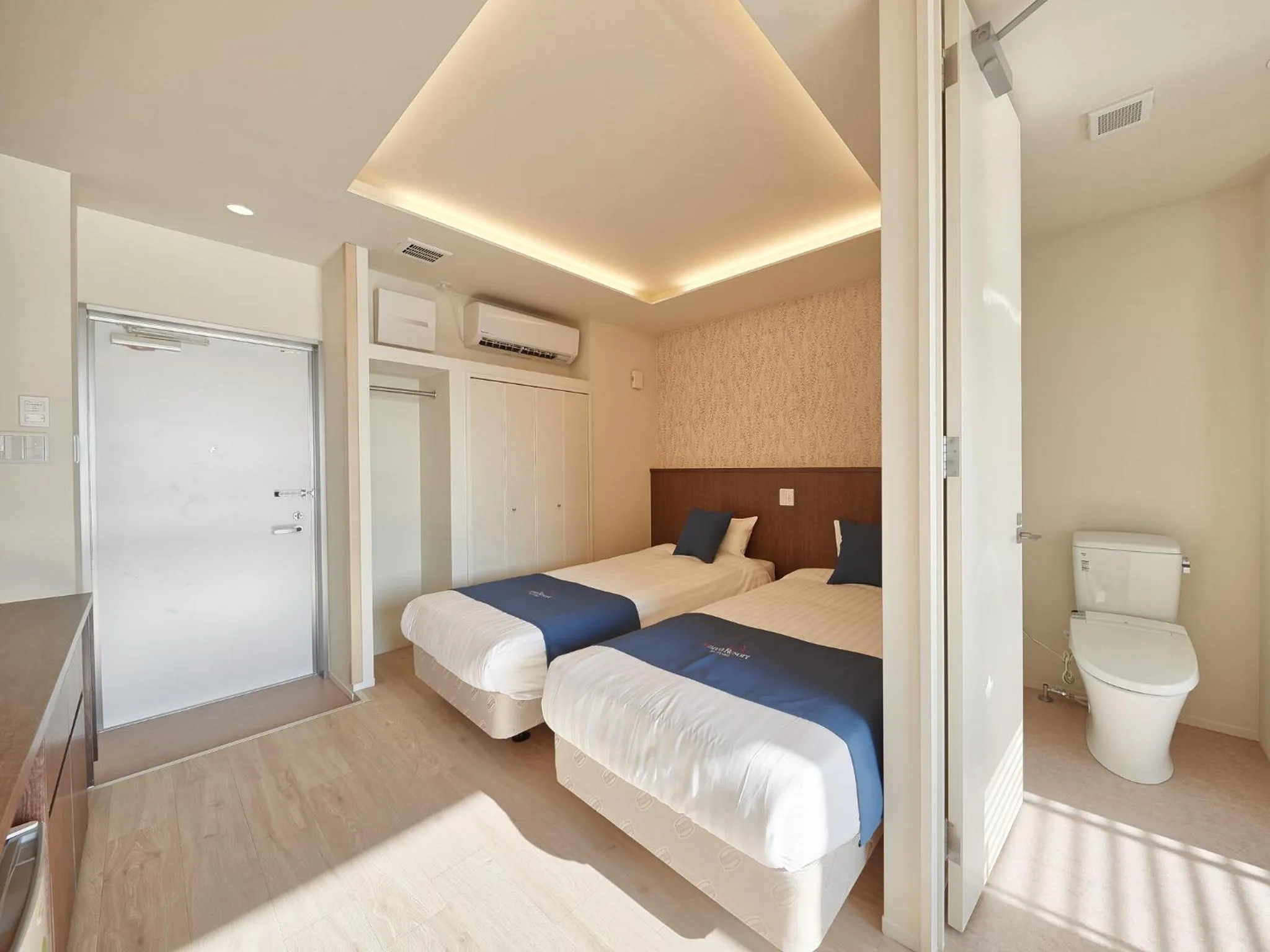 Photo of the whole room, Bed in Marea Resort Motobu