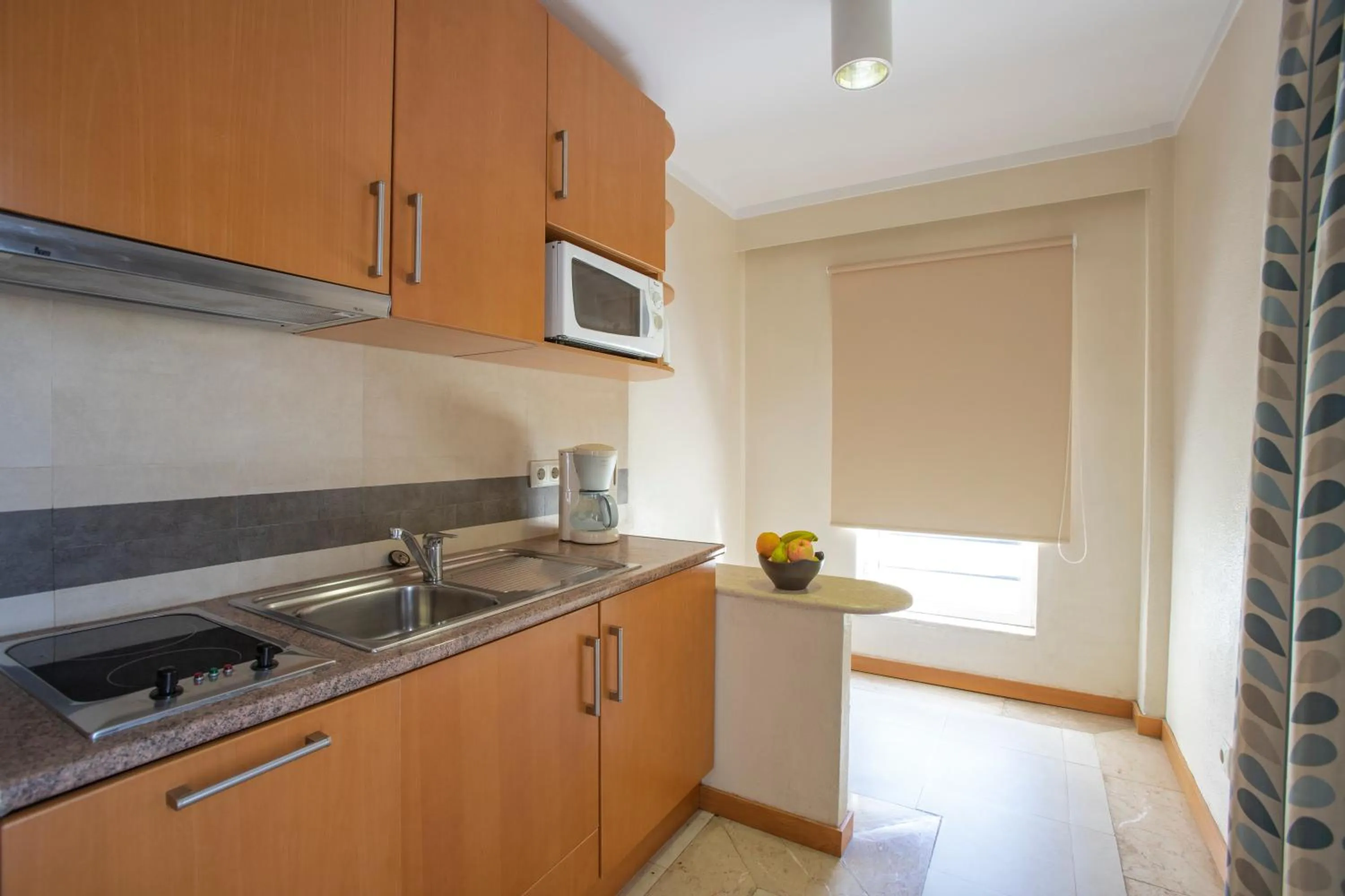 Kitchen or kitchenette in Interpass Vau Hotel Apartamentos