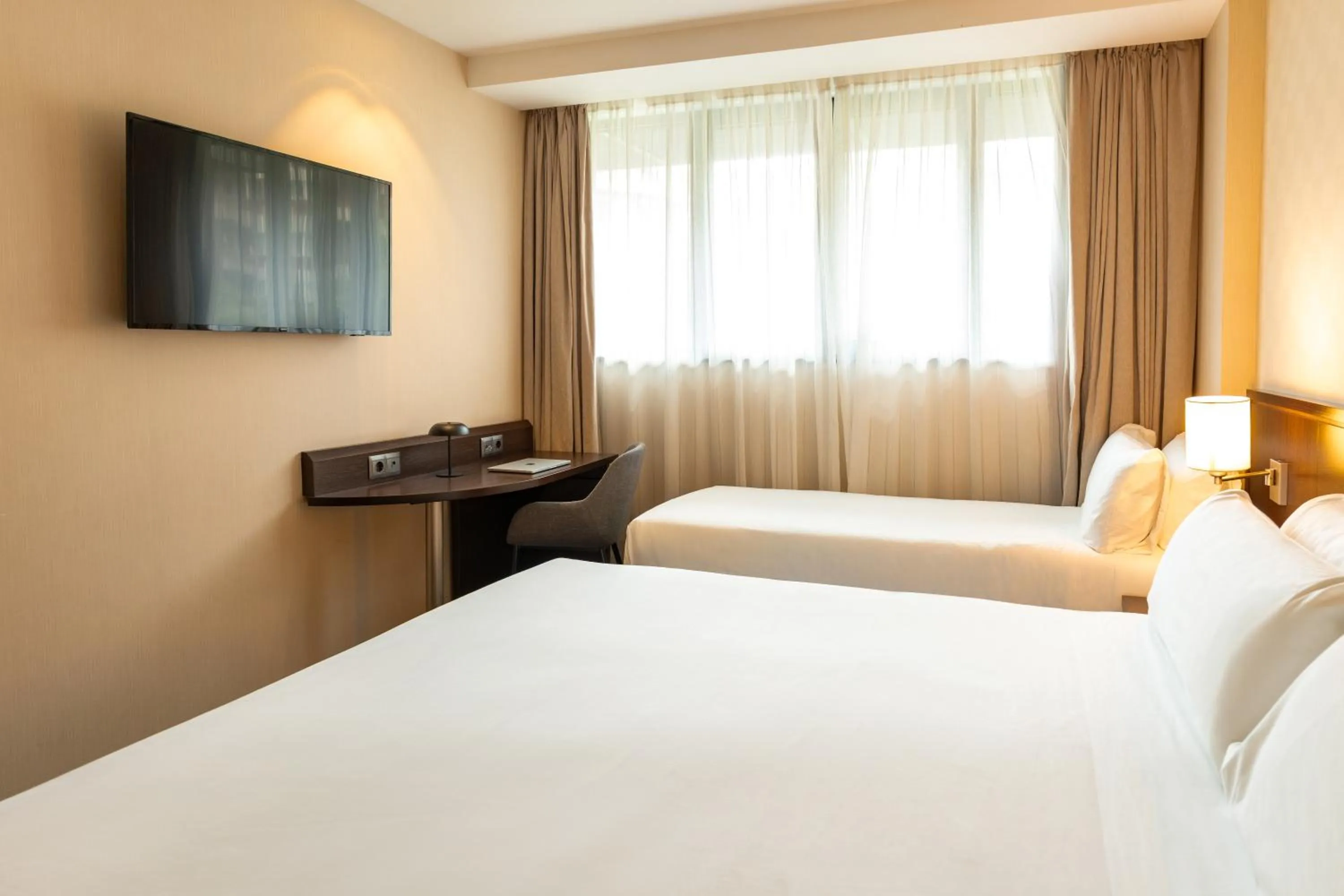 Bed in Hotel Lugano Barcelona