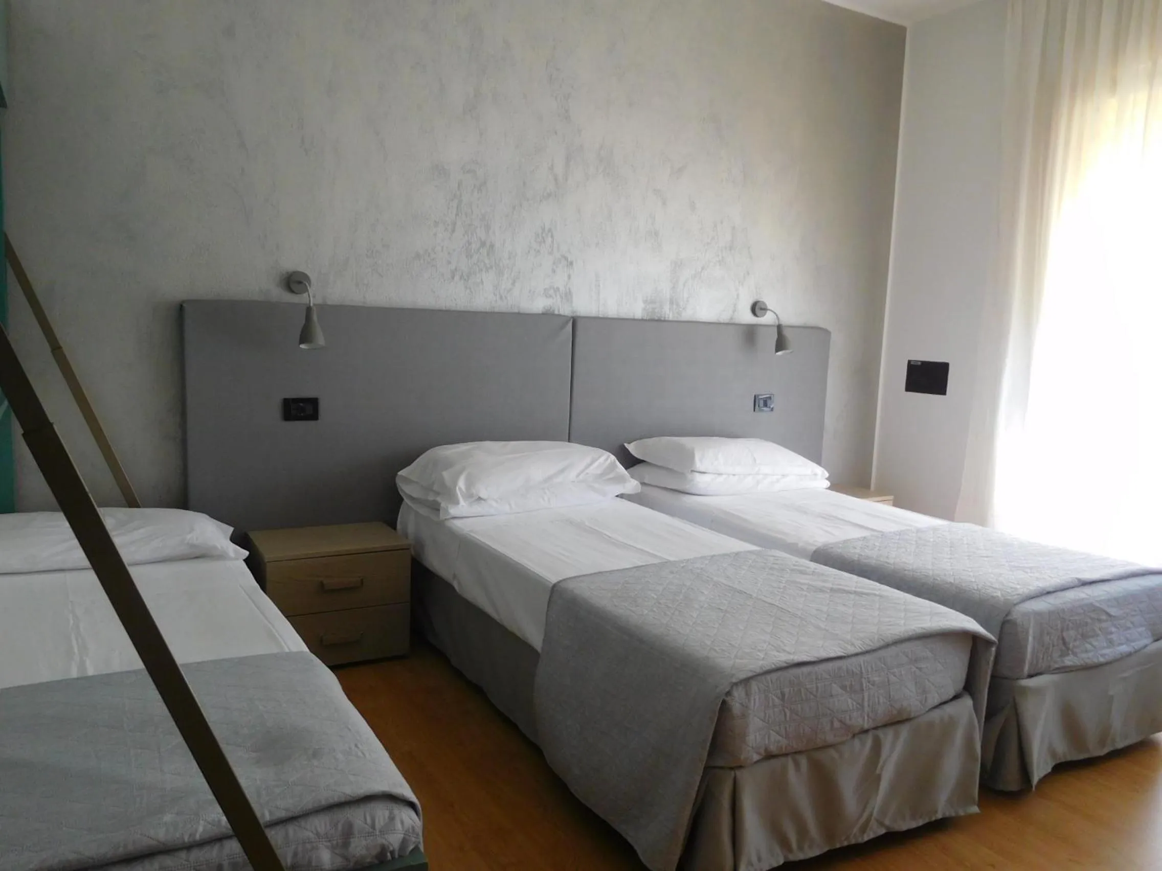 Bed in Hotel Emperador