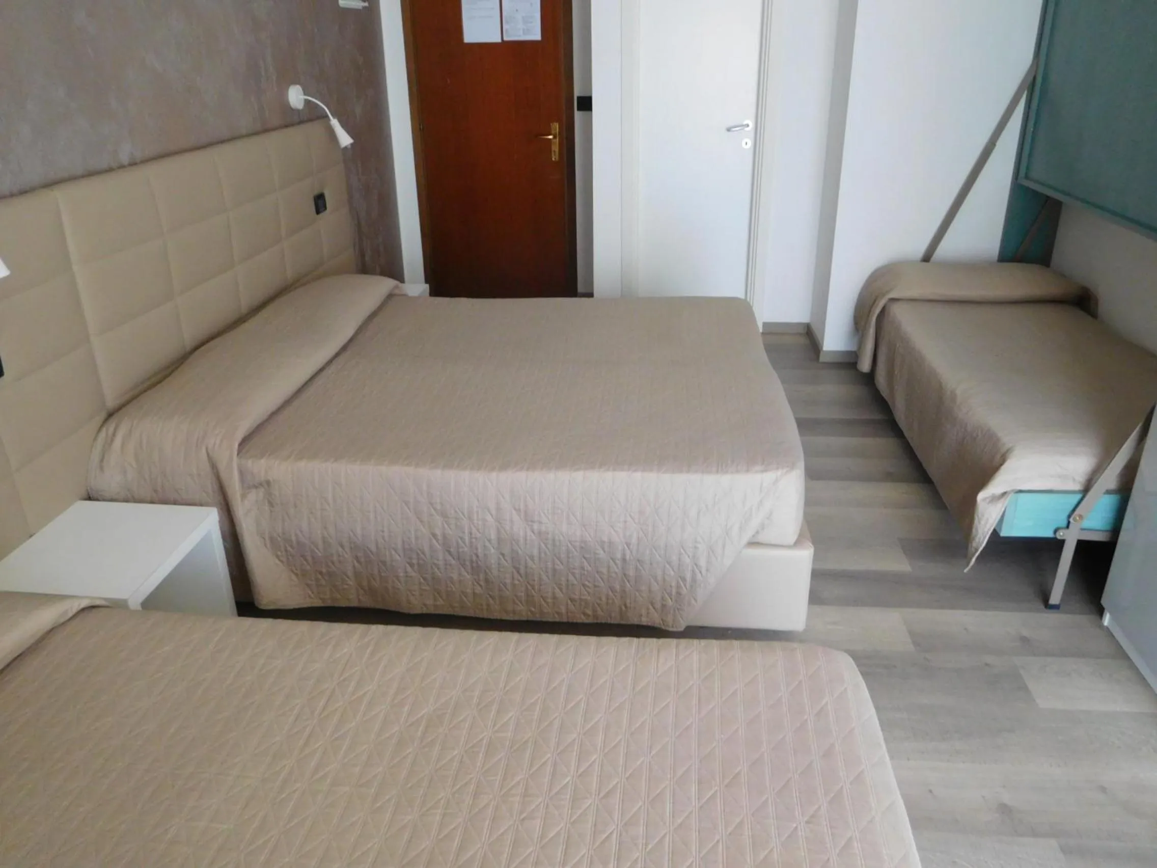 Bed in Hotel Emperador