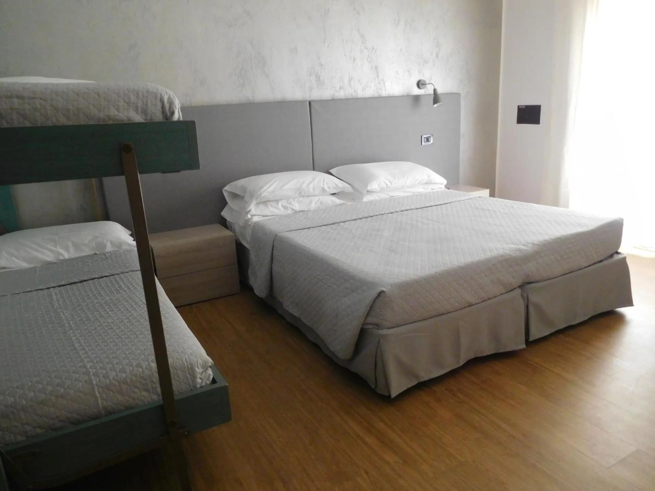 Bed in Hotel Emperador