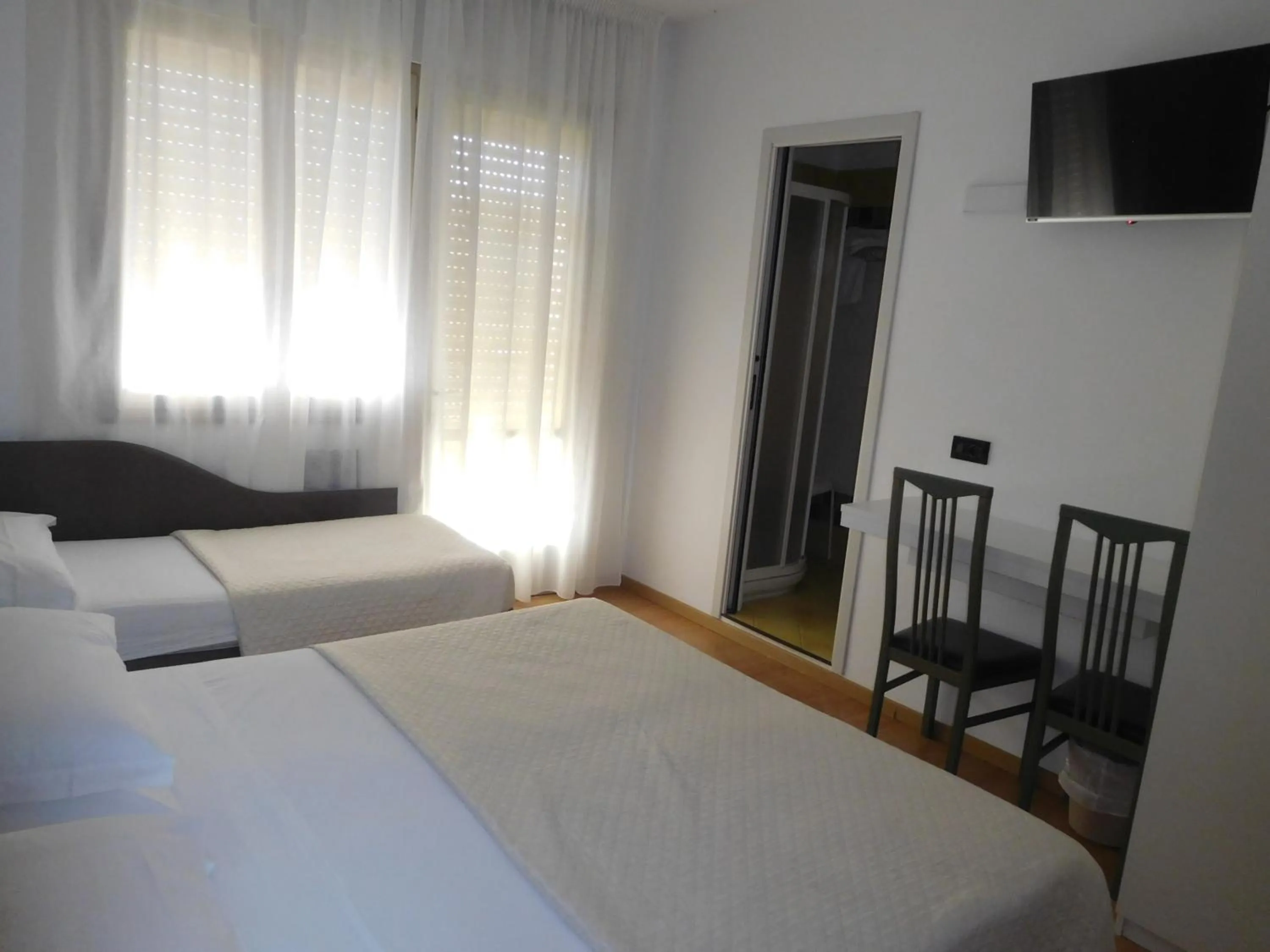 Bed in Hotel Emperador